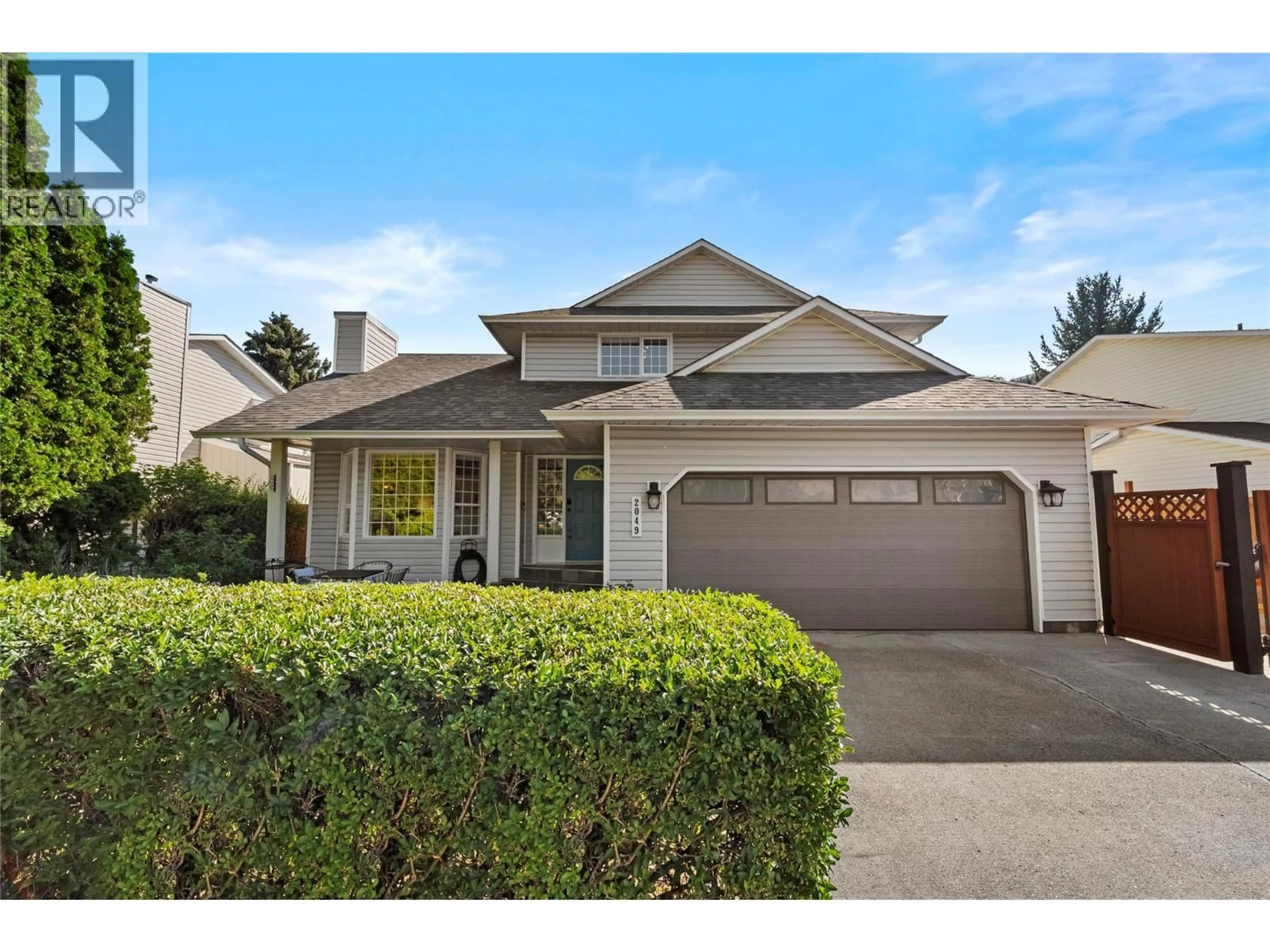Home with vinyl exterior material, street for 2049 TREMERTON DRIVE, Kamloops British Columbia V2E2L1