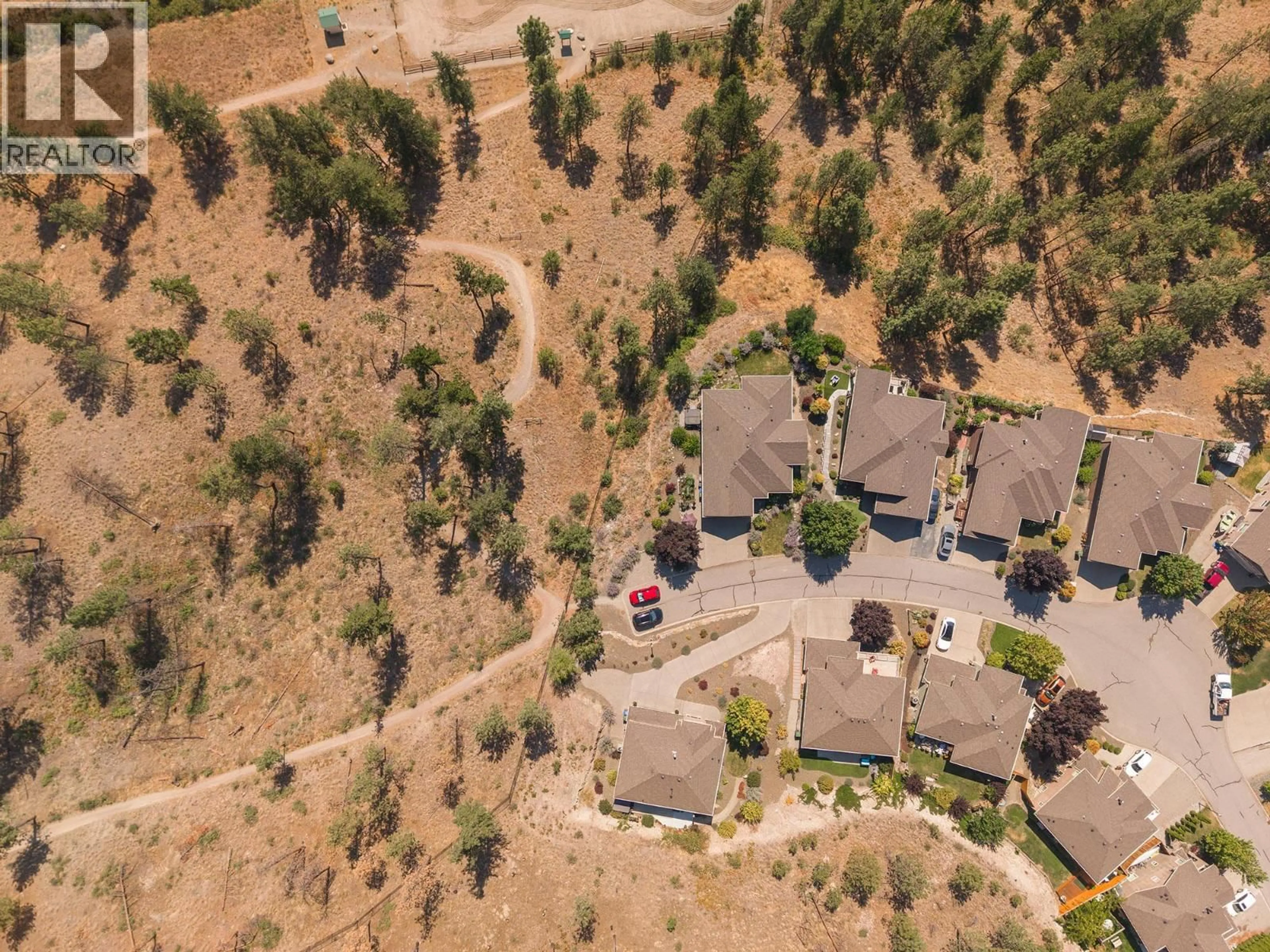 A pic from outside/outdoor area/front of a property/back of a property/a pic from drone, street for 35 - 2040 ROSEALEE LANE, West Kelowna British Columbia V1Z4C5