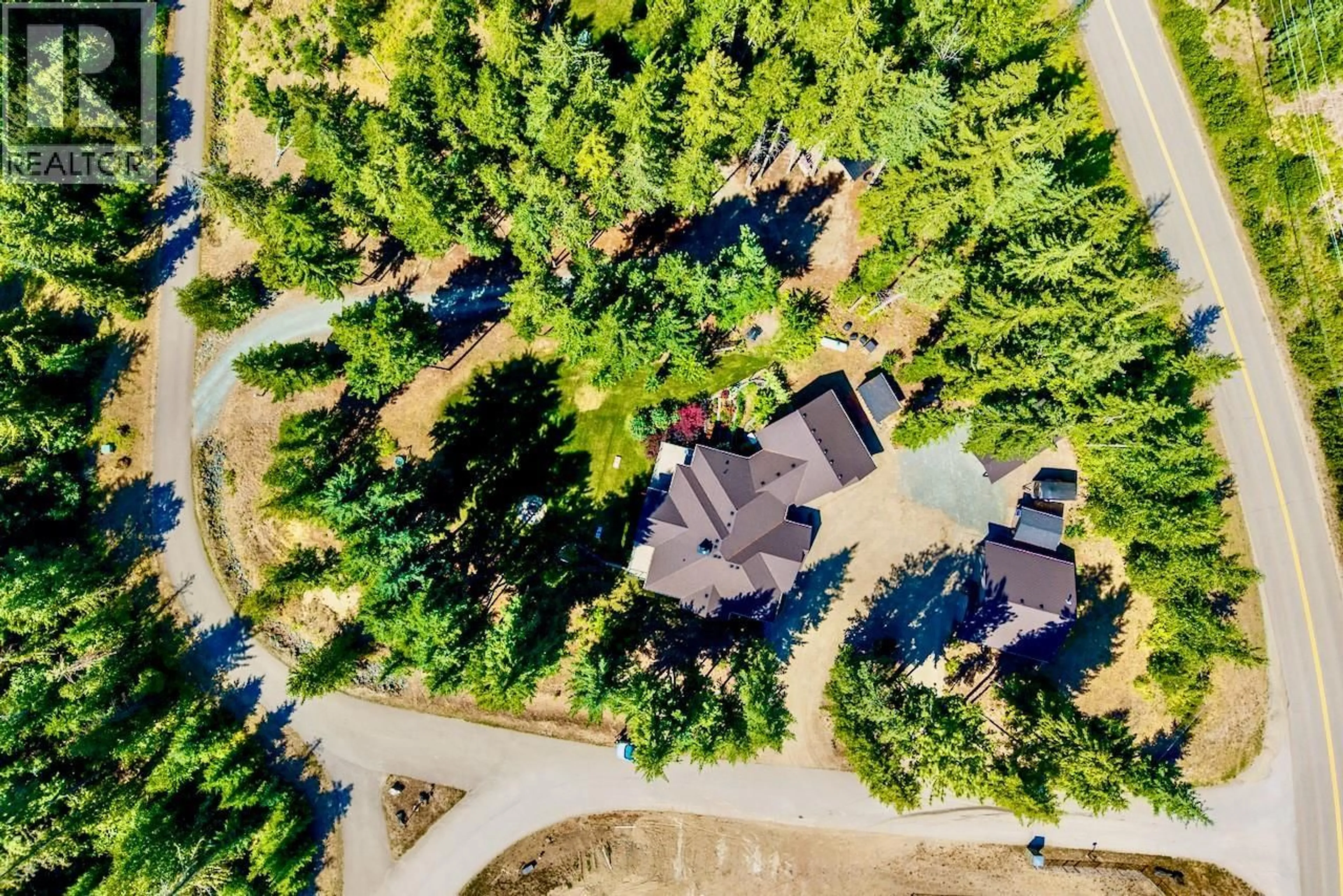 A pic from outside/outdoor area/front of a property/back of a property/a pic from drone, forest/trees view for 5864 SQUILAX-ANGLEMONT ROAD, Celista British Columbia V0E1M6