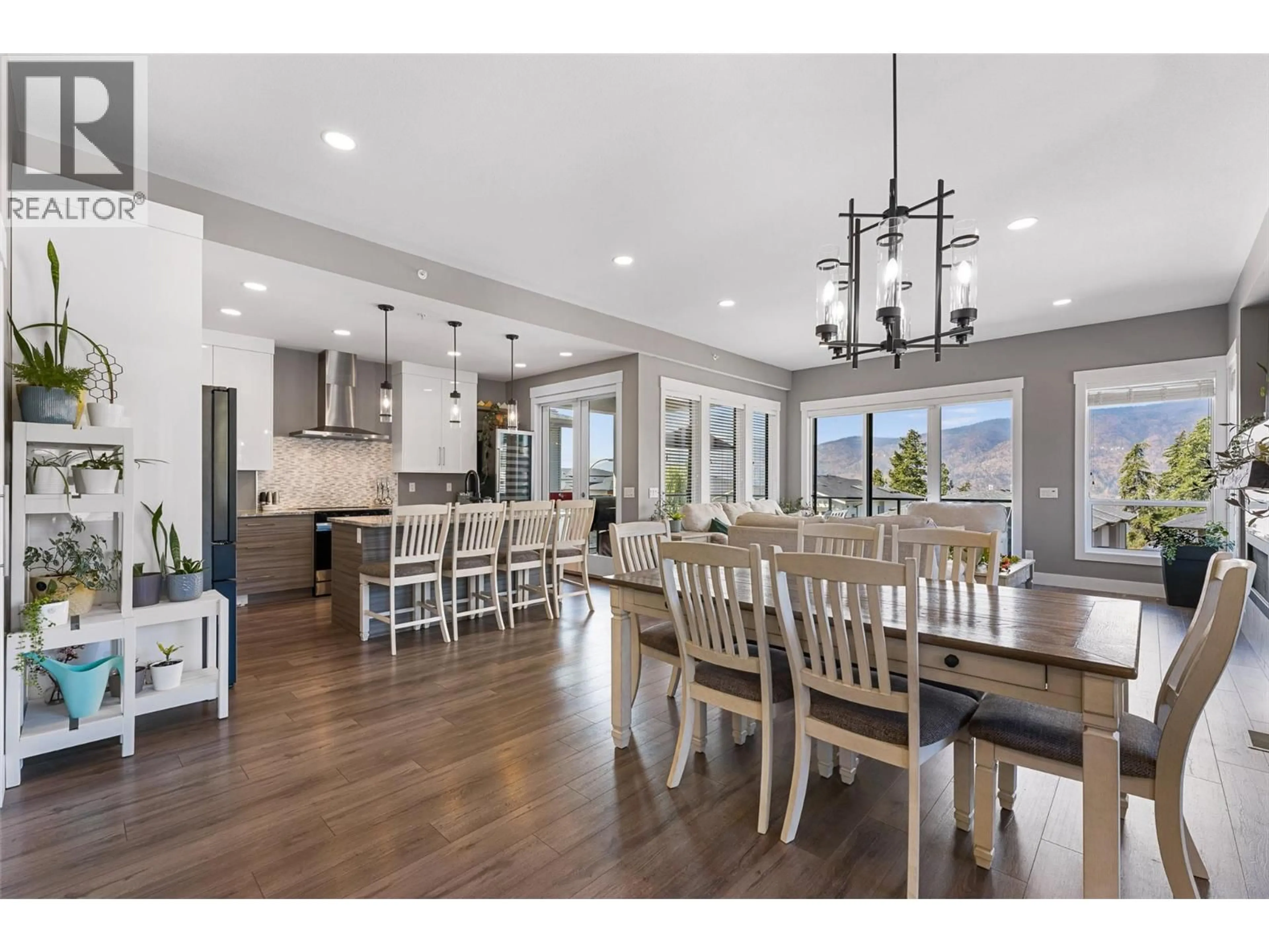 Open concept kitchen, wood/laminate floor for 8819 HERITAGE DRIVE, Lake Country British Columbia V4V2W2