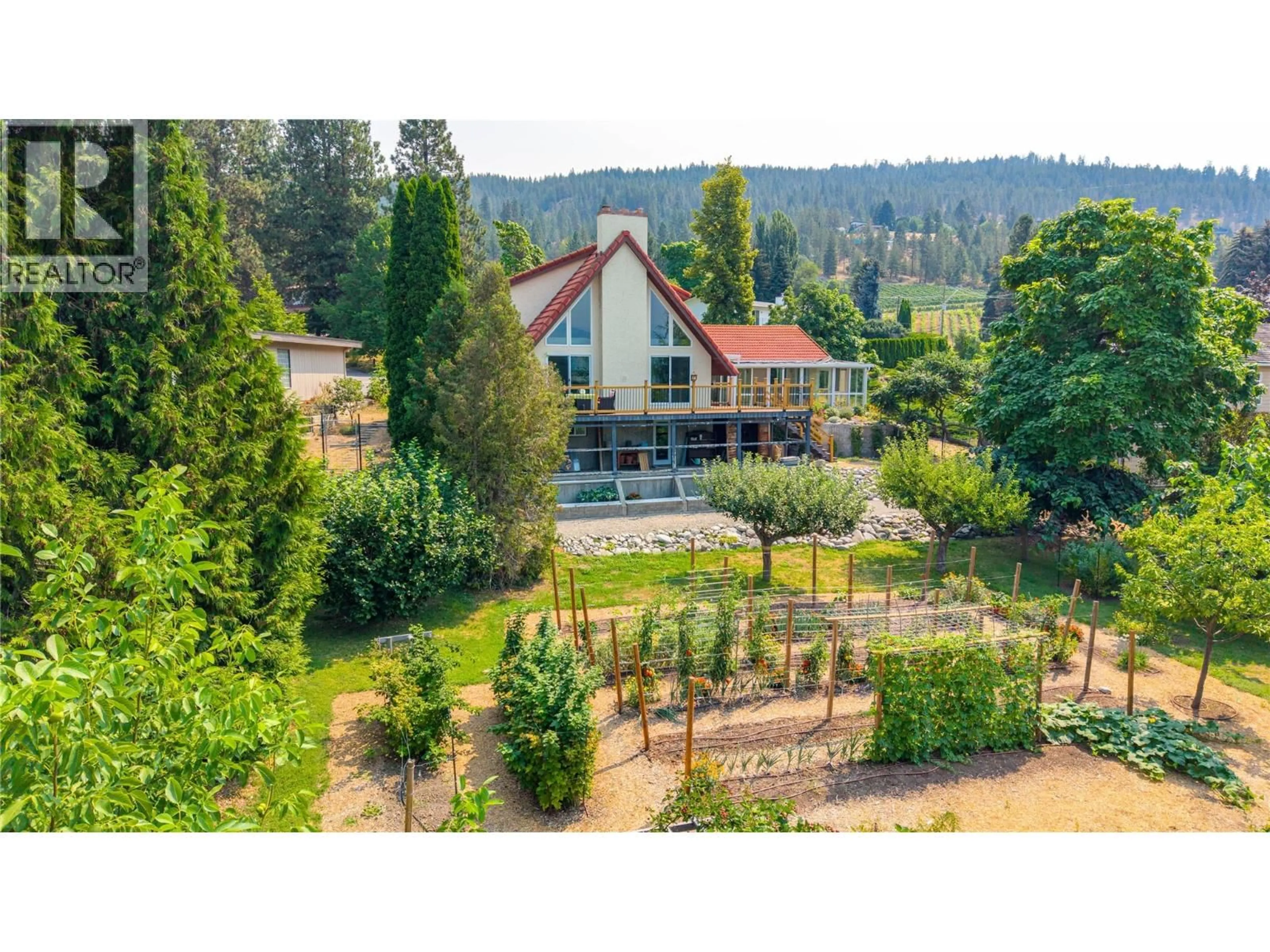 A pic from outside/outdoor area/front of a property/back of a property/a pic from drone, mountain view for 3015 PONDEROSA DRIVE, Naramata British Columbia V0H1N1