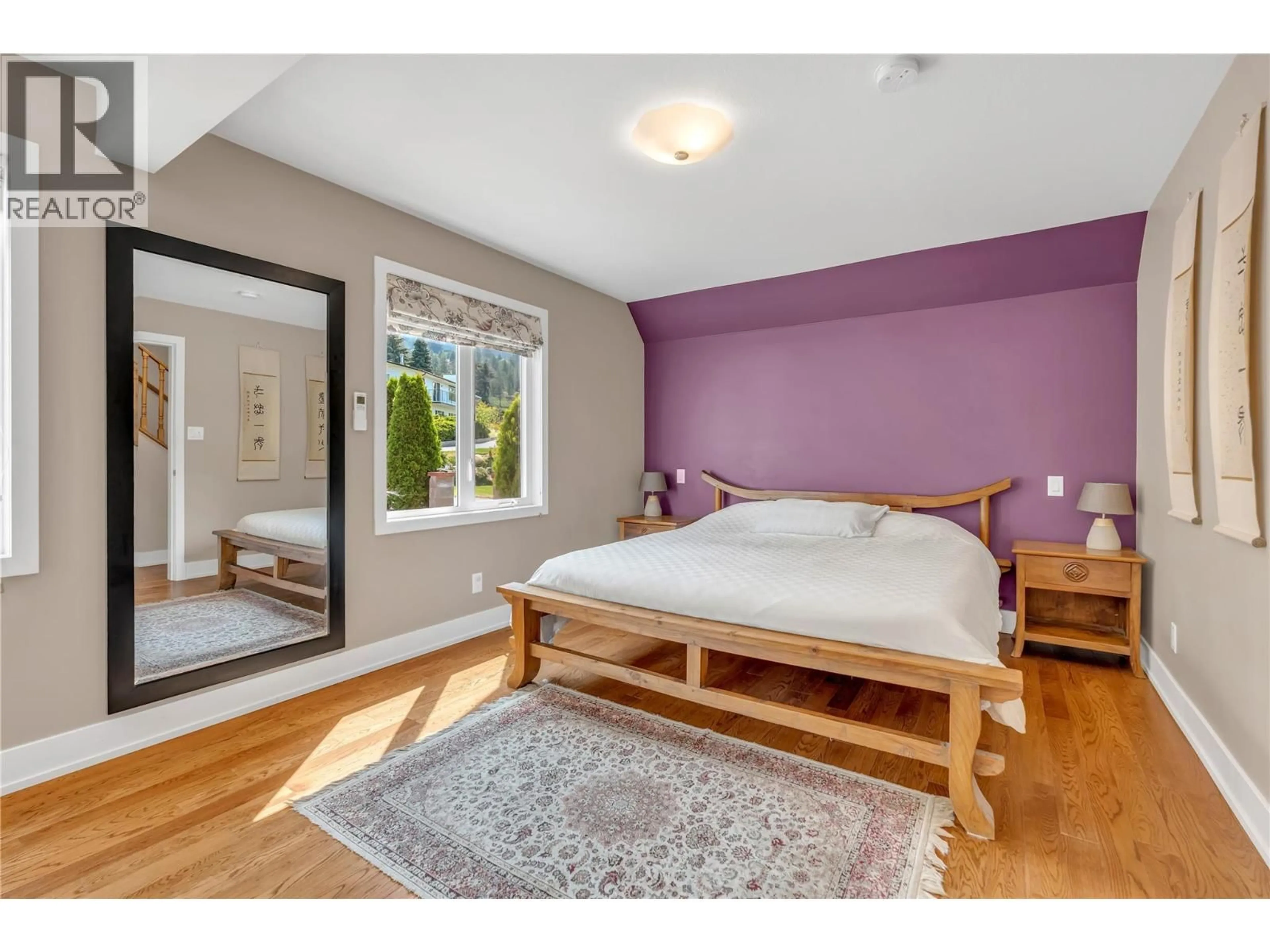 Bedroom with bed, wood/laminate floor for 3015 PONDEROSA DRIVE, Naramata British Columbia V0H1N1