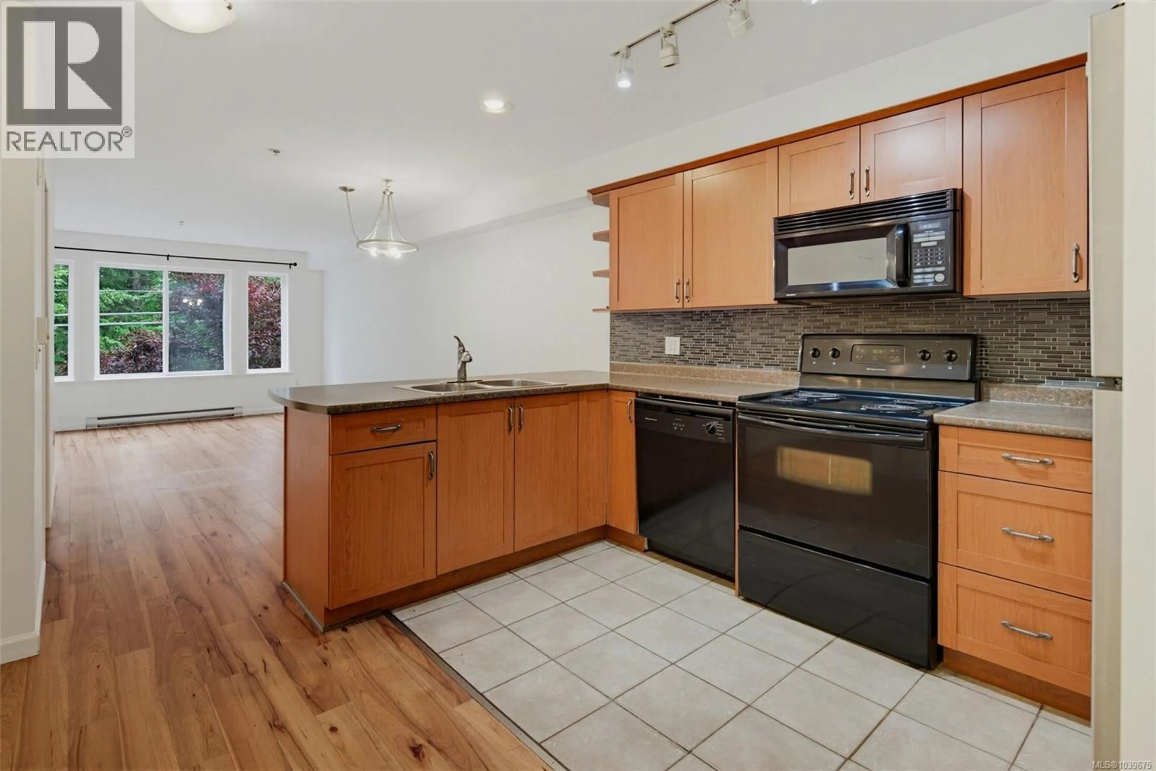 Open concept kitchen, unknown for 307 - 364 GOLDSTREAM AVENUE, Colwood British Columbia V9B2W3