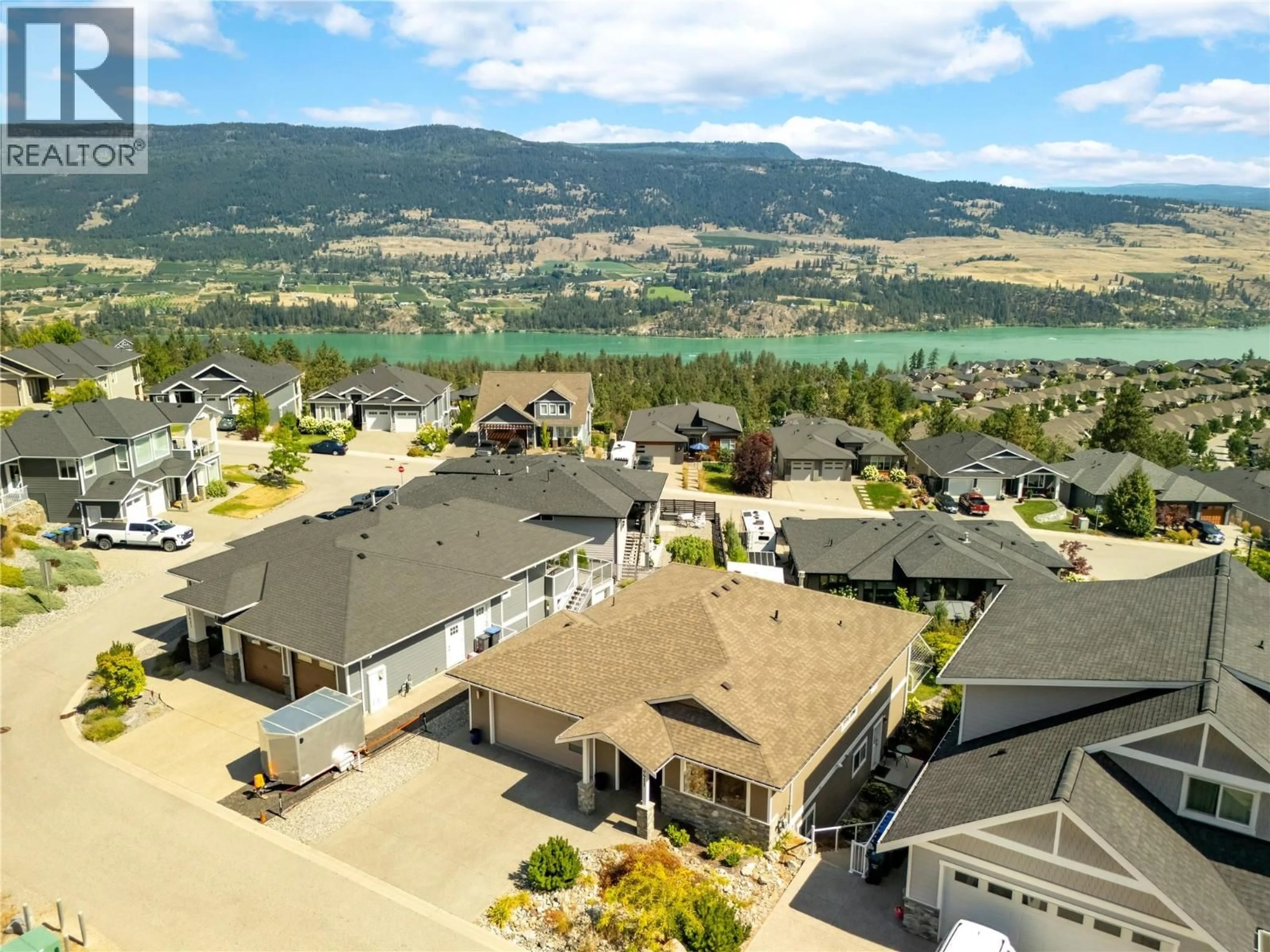 A pic from outside/outdoor area/front of a property/back of a property/a pic from drone, mountain view for 13411 APEX LANE, Lake Country British Columbia V4V2W3