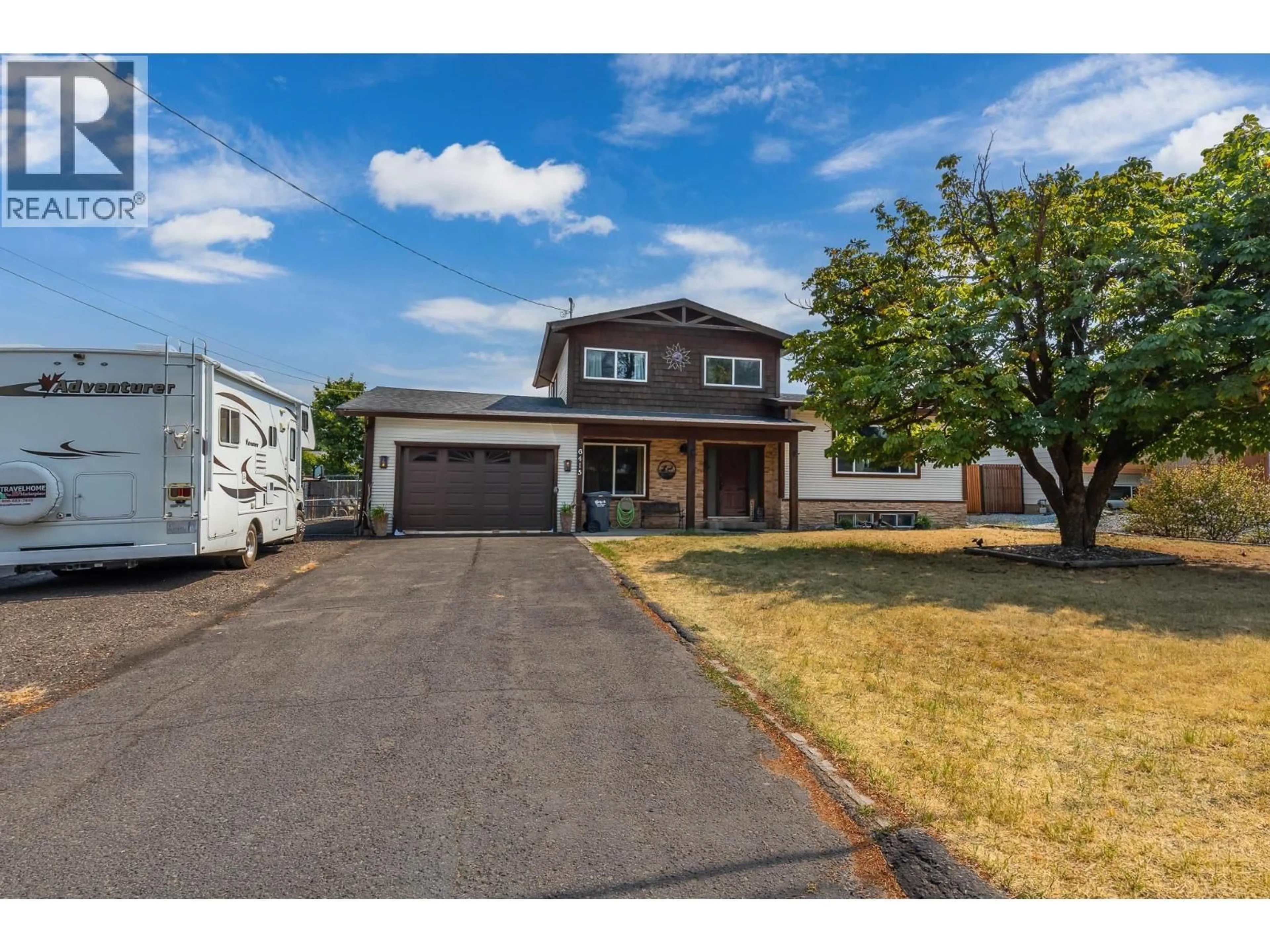 Home with vinyl exterior material, street for 6415 GLENDORA WAY, Coldstream British Columbia V1B3G5