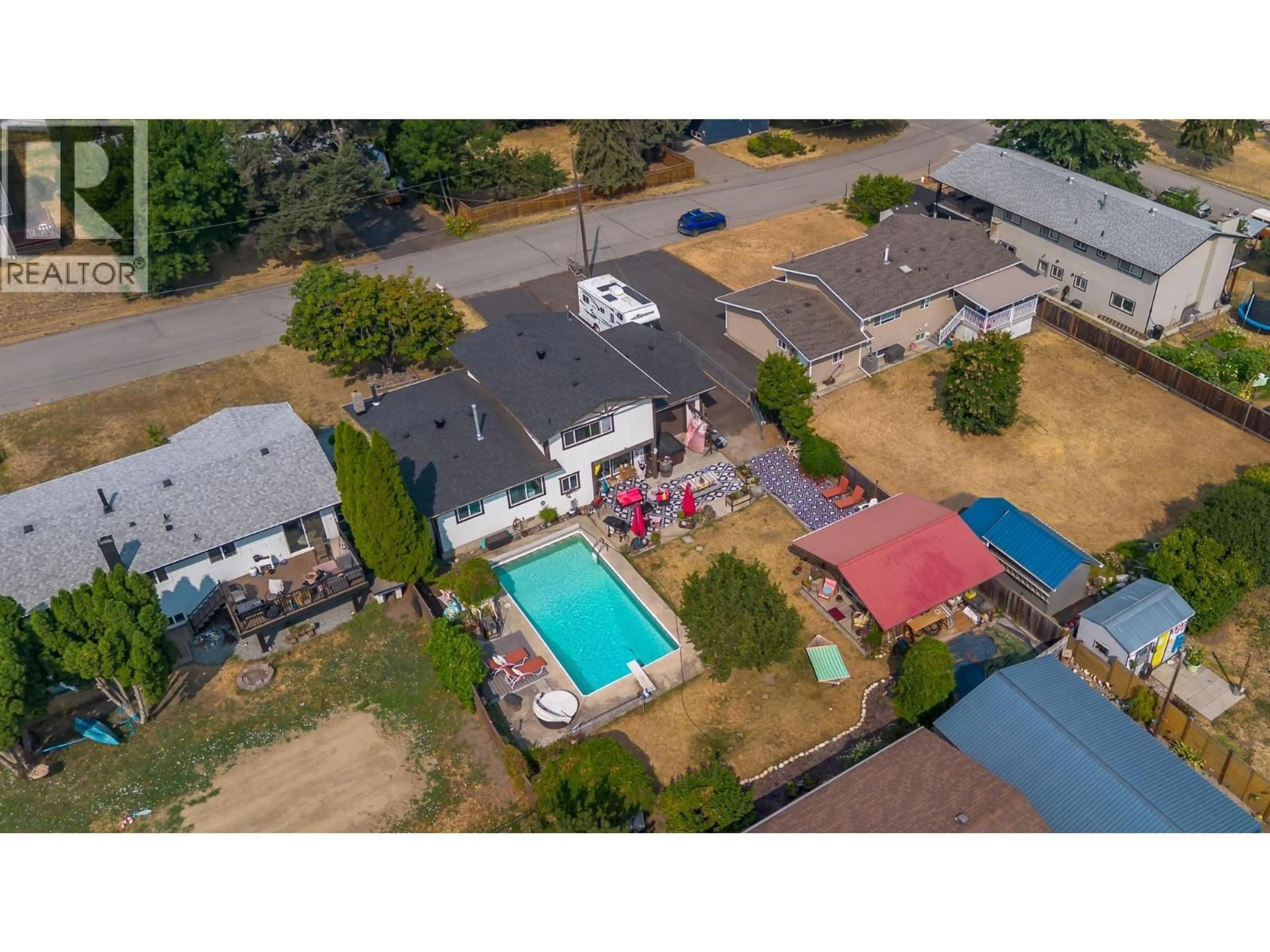 A pic from outside/outdoor area/front of a property/back of a property/a pic from drone, unknown for 6415 GLENDORA WAY, Coldstream British Columbia V1B3G5