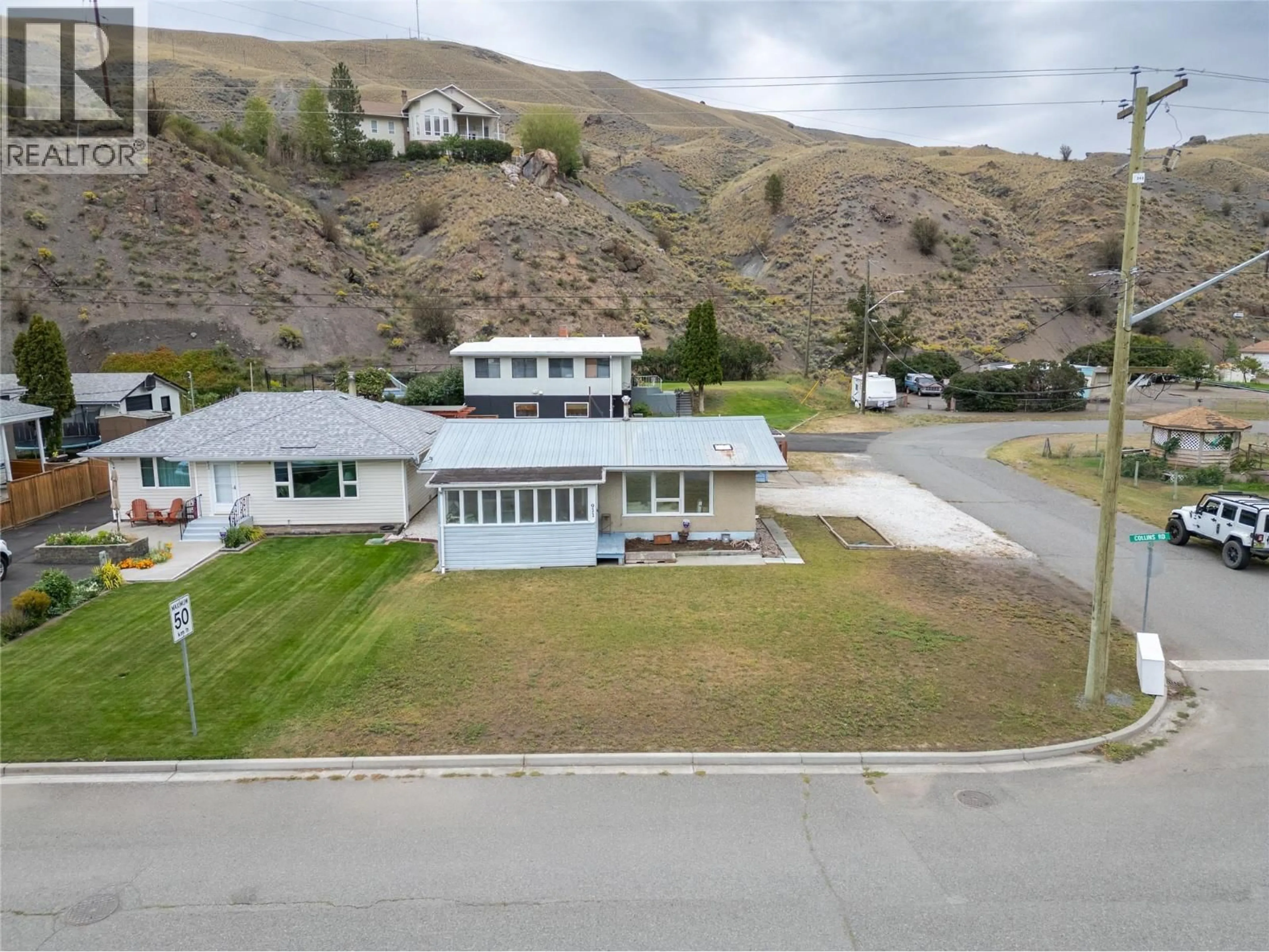 A pic from outside/outdoor area/front of a property/back of a property/a pic from drone, mountain view for 911 COLLINS ROAD, Cache Creek British Columbia V0K1H0