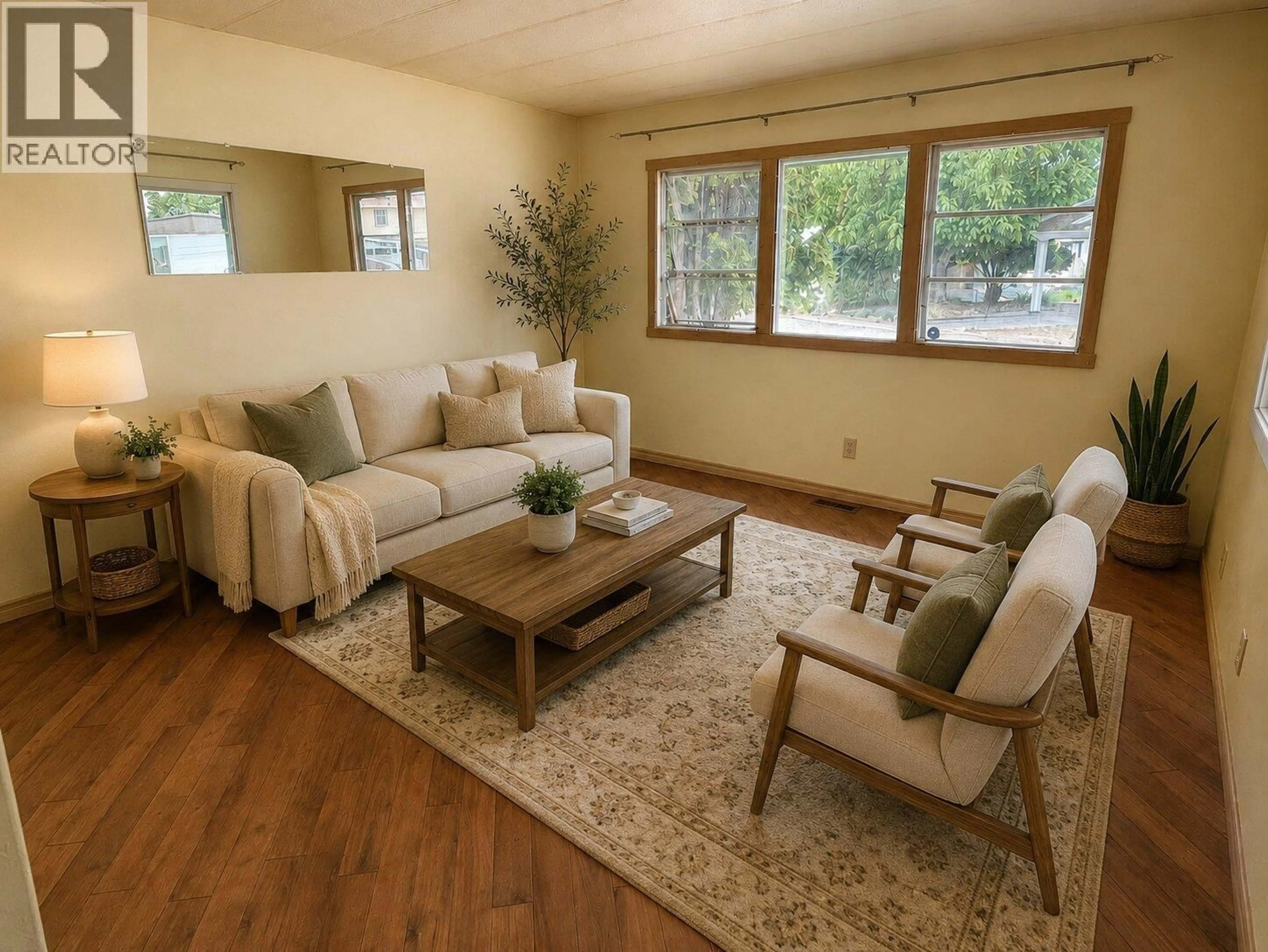 Living room with furniture, wood/laminate floor for 96 - 3245 PARIS STREET, Penticton British Columbia V2A3T9