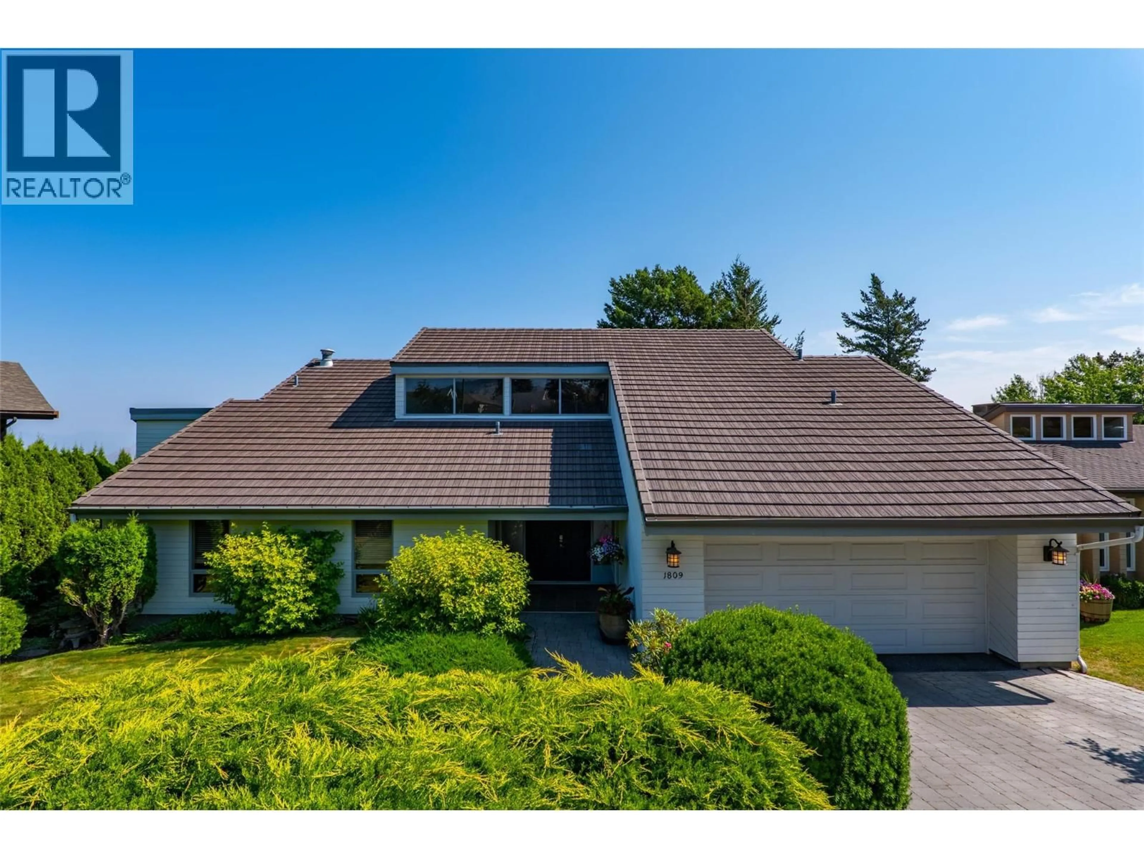 Home with vinyl exterior material, street for 1809 BREAKENRIDGE COURT, Kamloops British Columbia V2E1W9