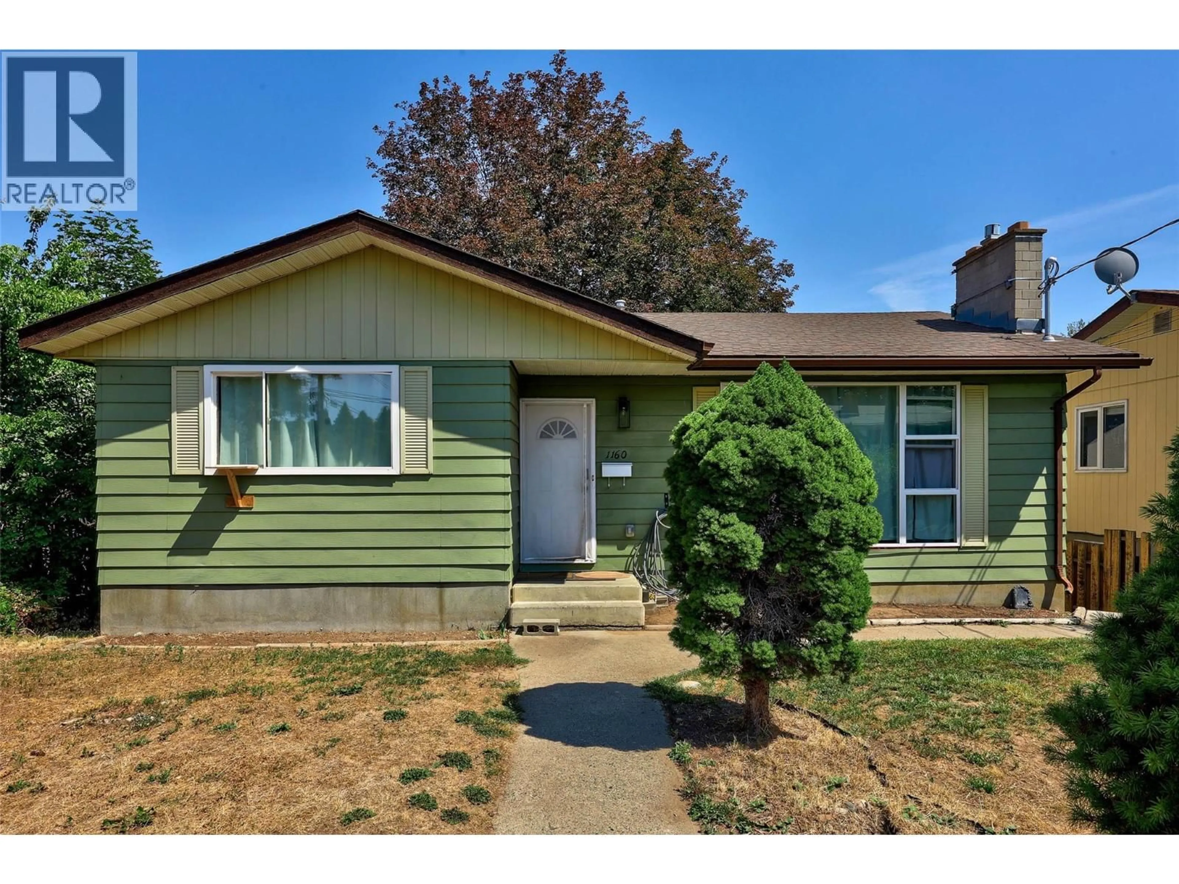Home with vinyl exterior material, street for 1160 KEMANO STREET, Kamloops British Columbia V2B7M2