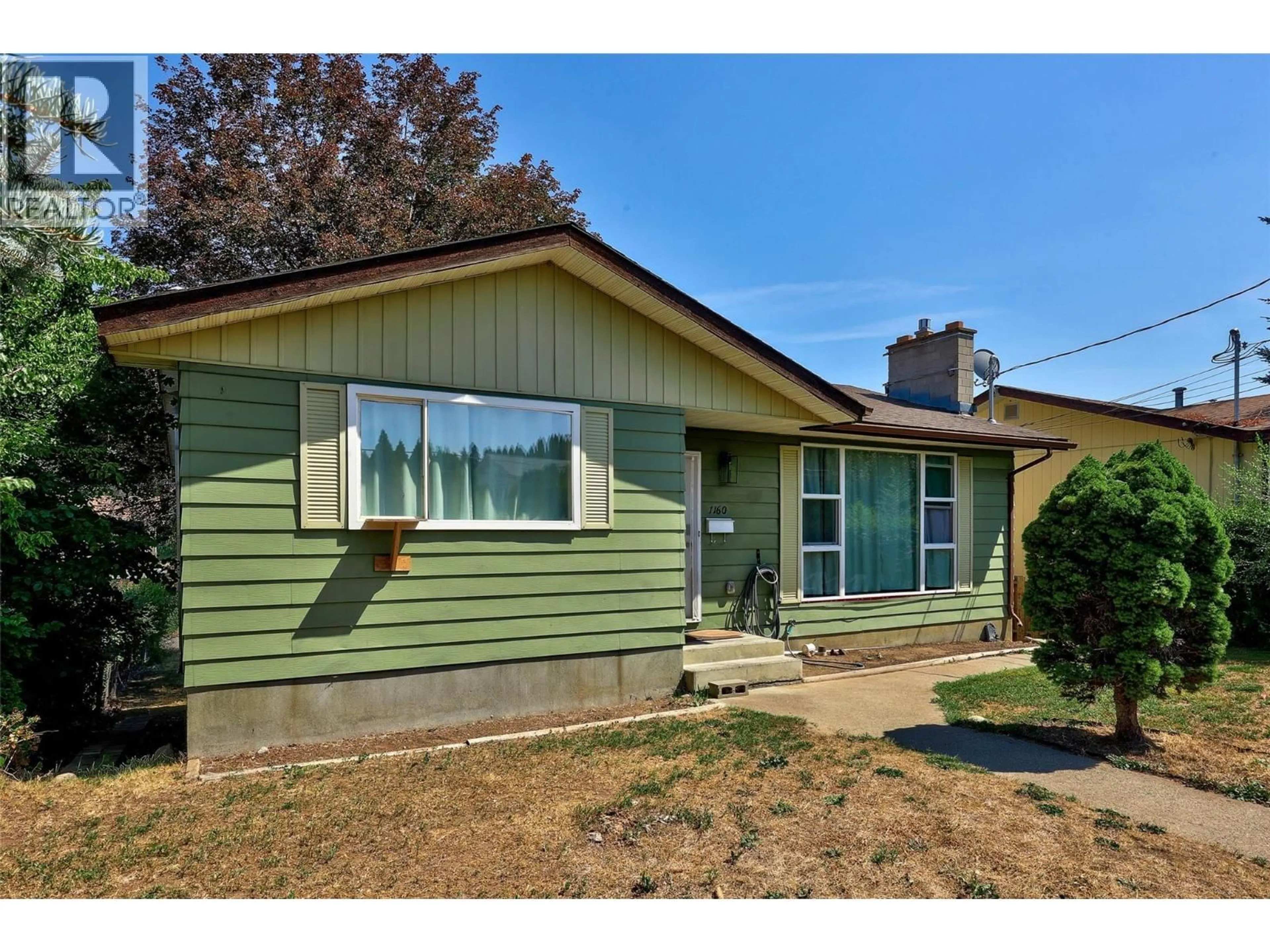 Home with vinyl exterior material, street for 1160 KEMANO STREET, Kamloops British Columbia V2B7M2