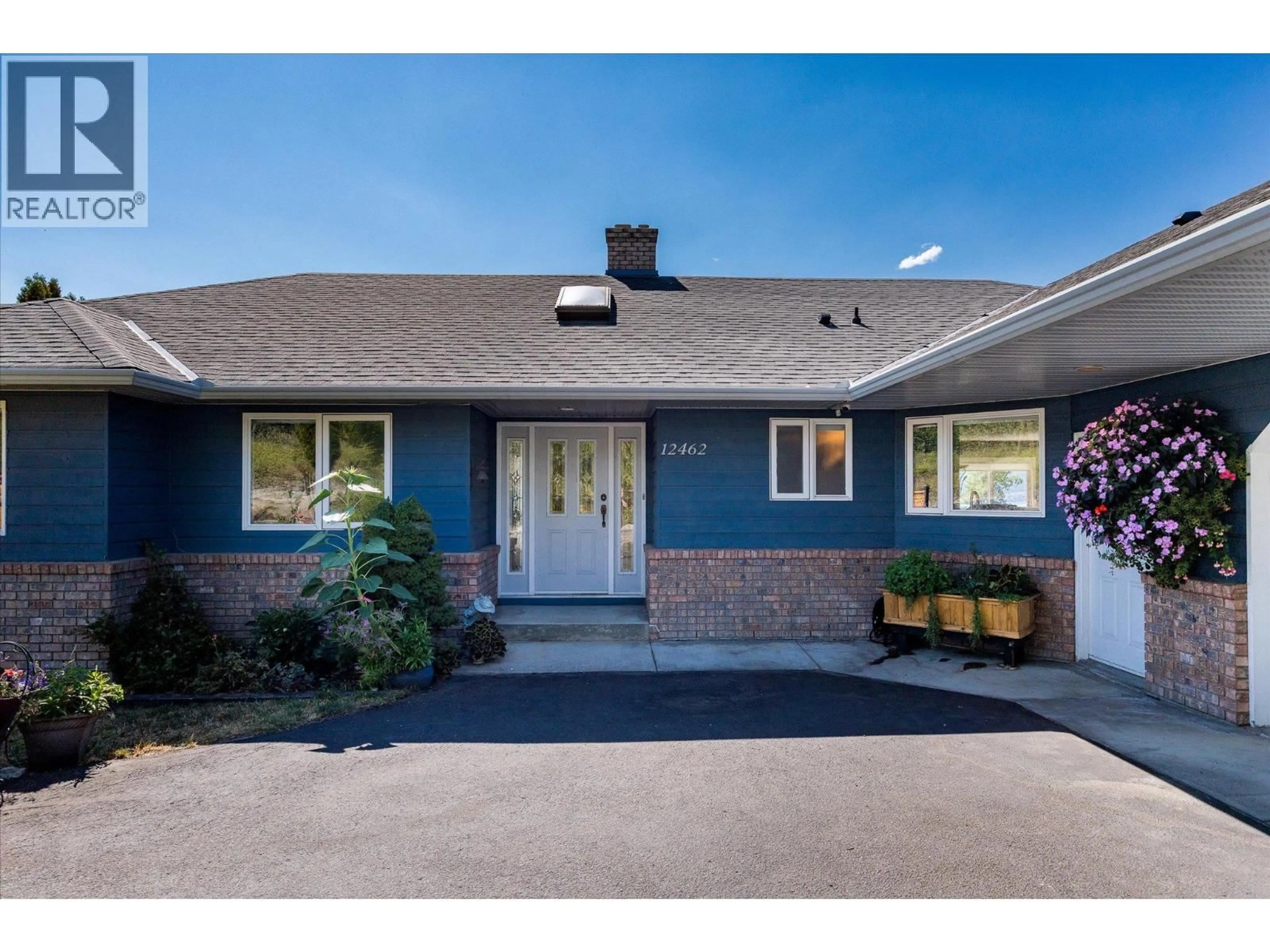 Home with brick exterior material, street for 12462 CARRS LANDING ROAD, Lake Country British Columbia V4V1A1
