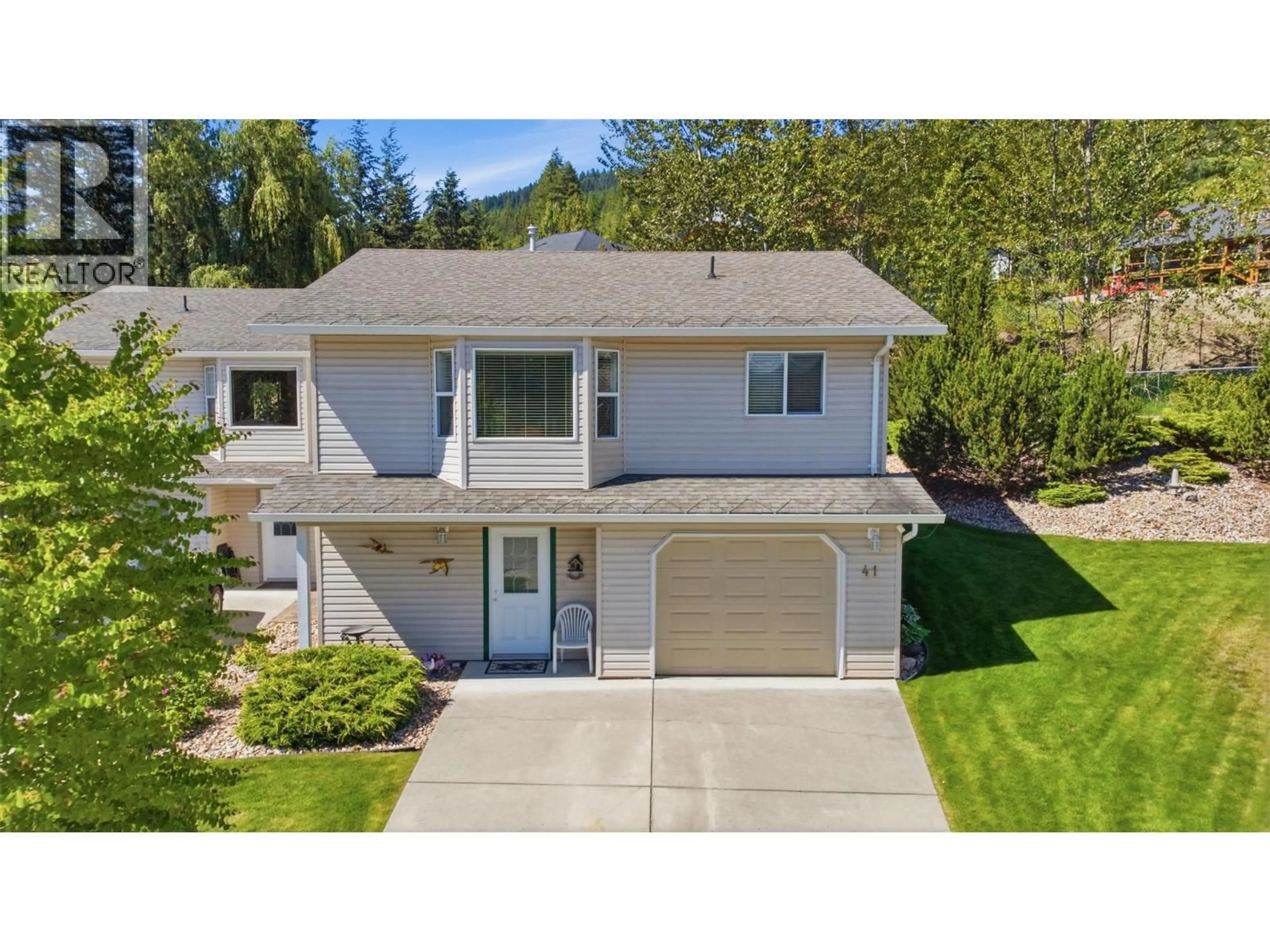A pic from outside/outdoor area/front of a property/back of a property/a pic from drone, street for 41 - 2675 PINE AVENUE, Lumby British Columbia V0E2G5