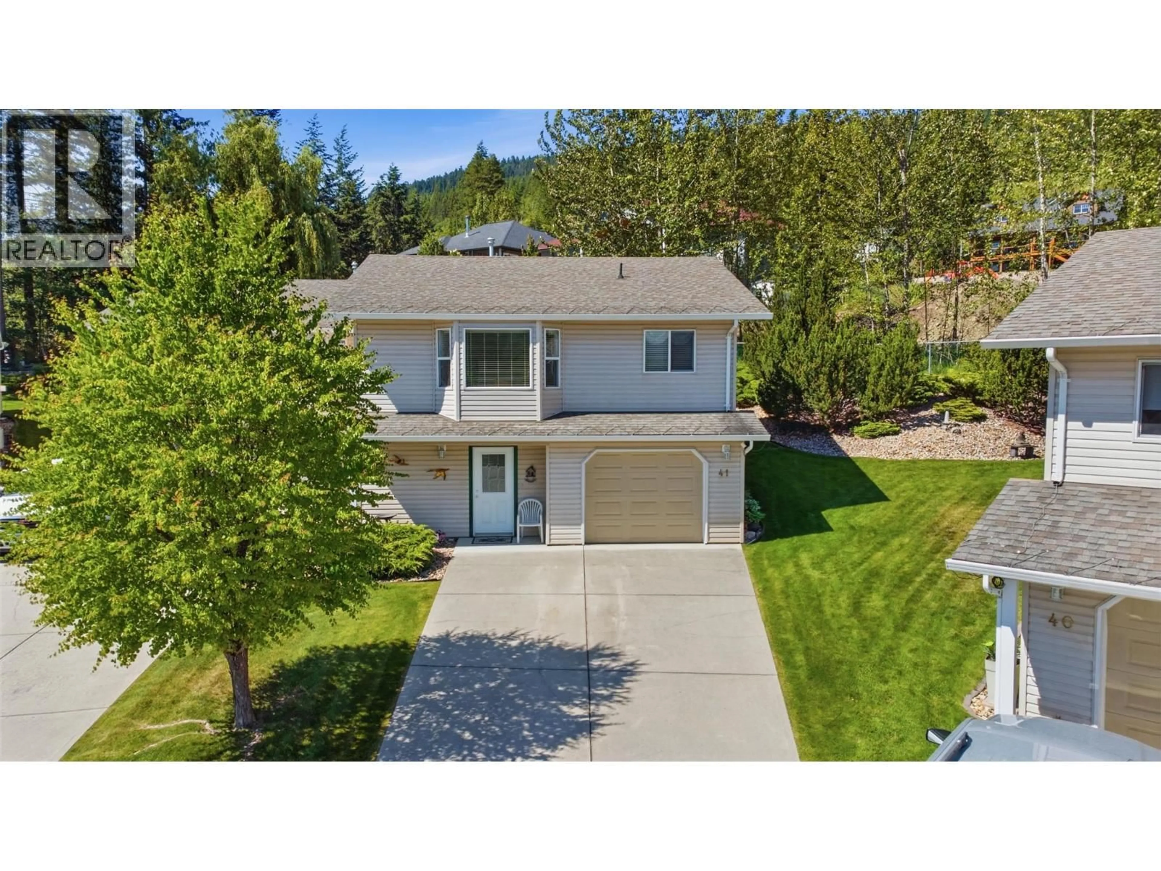 A pic from outside/outdoor area/front of a property/back of a property/a pic from drone, street for 41 - 2675 PINE AVENUE, Lumby British Columbia V0E2G5