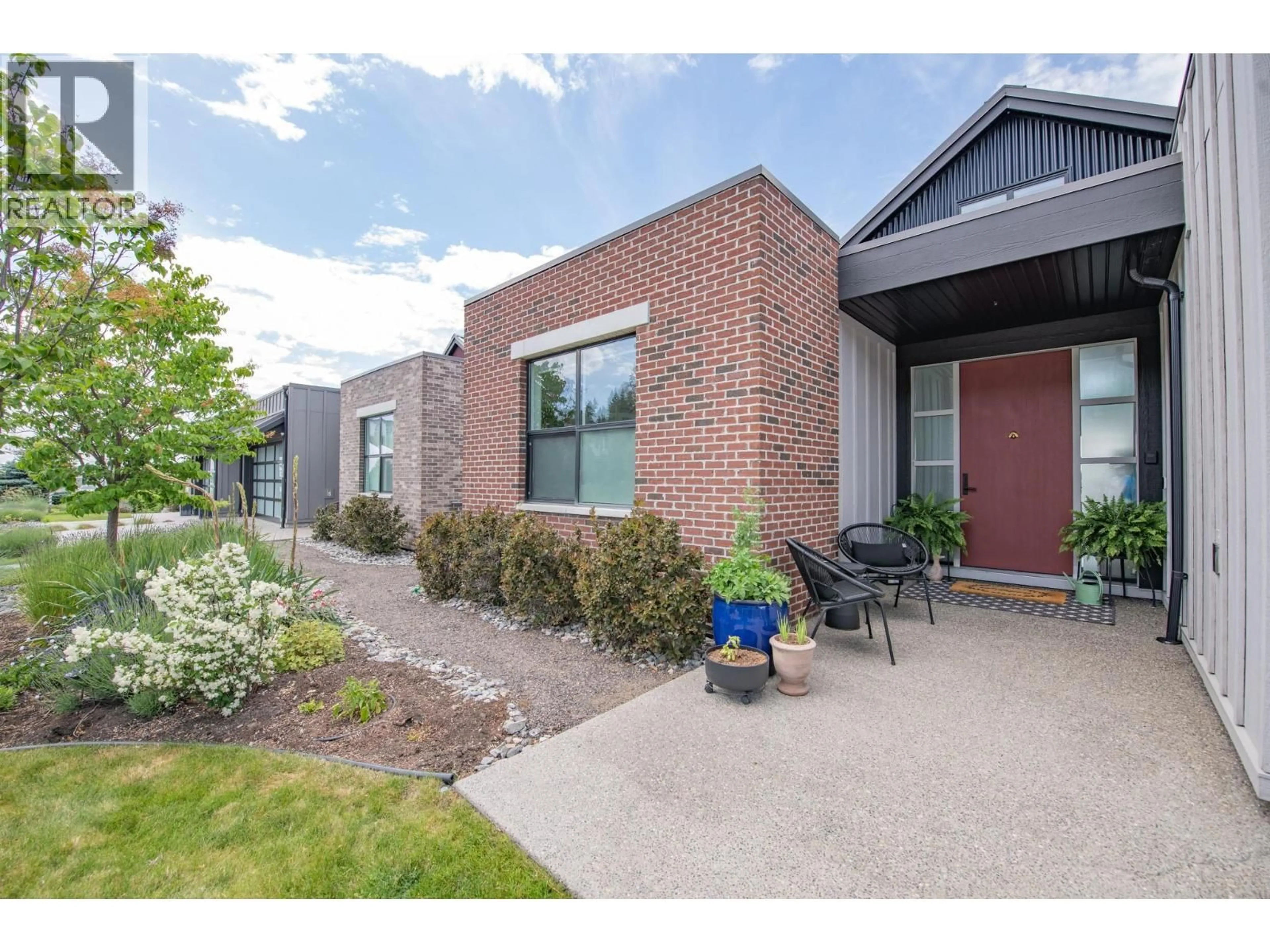 Home with brick exterior material, street for 213 ASHCROFT PLACE, Vernon British Columbia V1H2M1