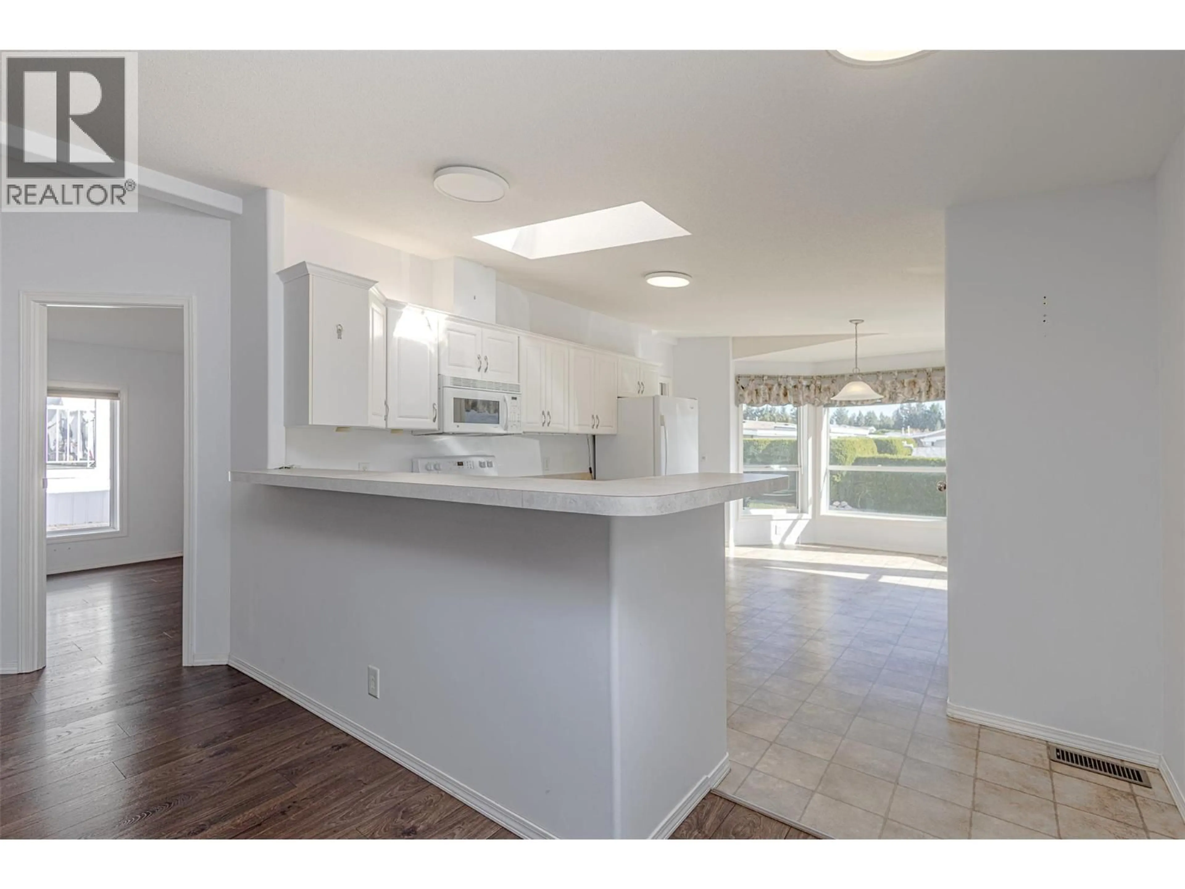 Open concept kitchen, unknown for 209 - 1850 SHANNON LAKE ROAD, West Kelowna British Columbia V4T1L6
