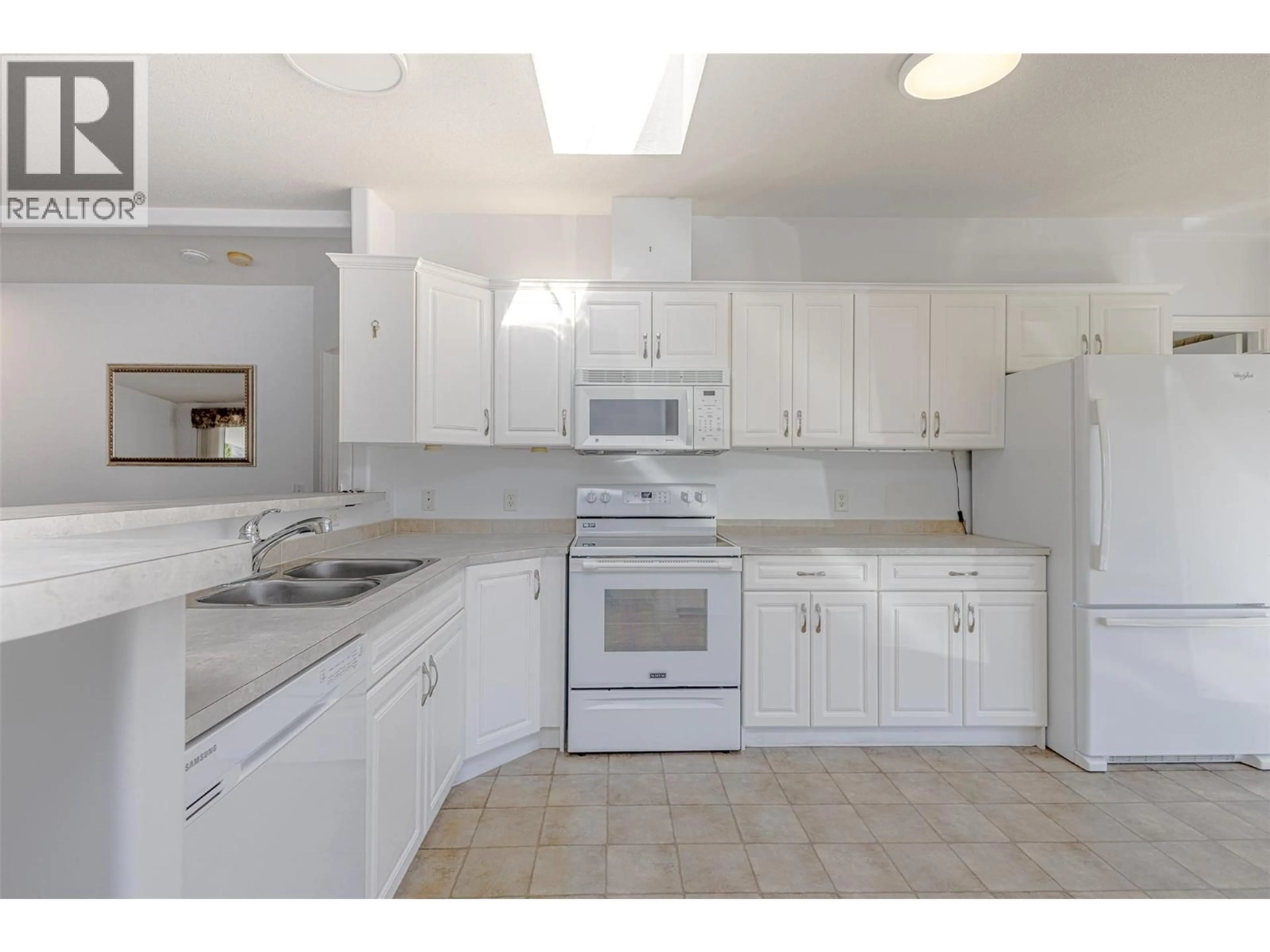 Standard kitchen, ceramic/tile floor for 209 - 1850 SHANNON LAKE ROAD, West Kelowna British Columbia V4T1L6