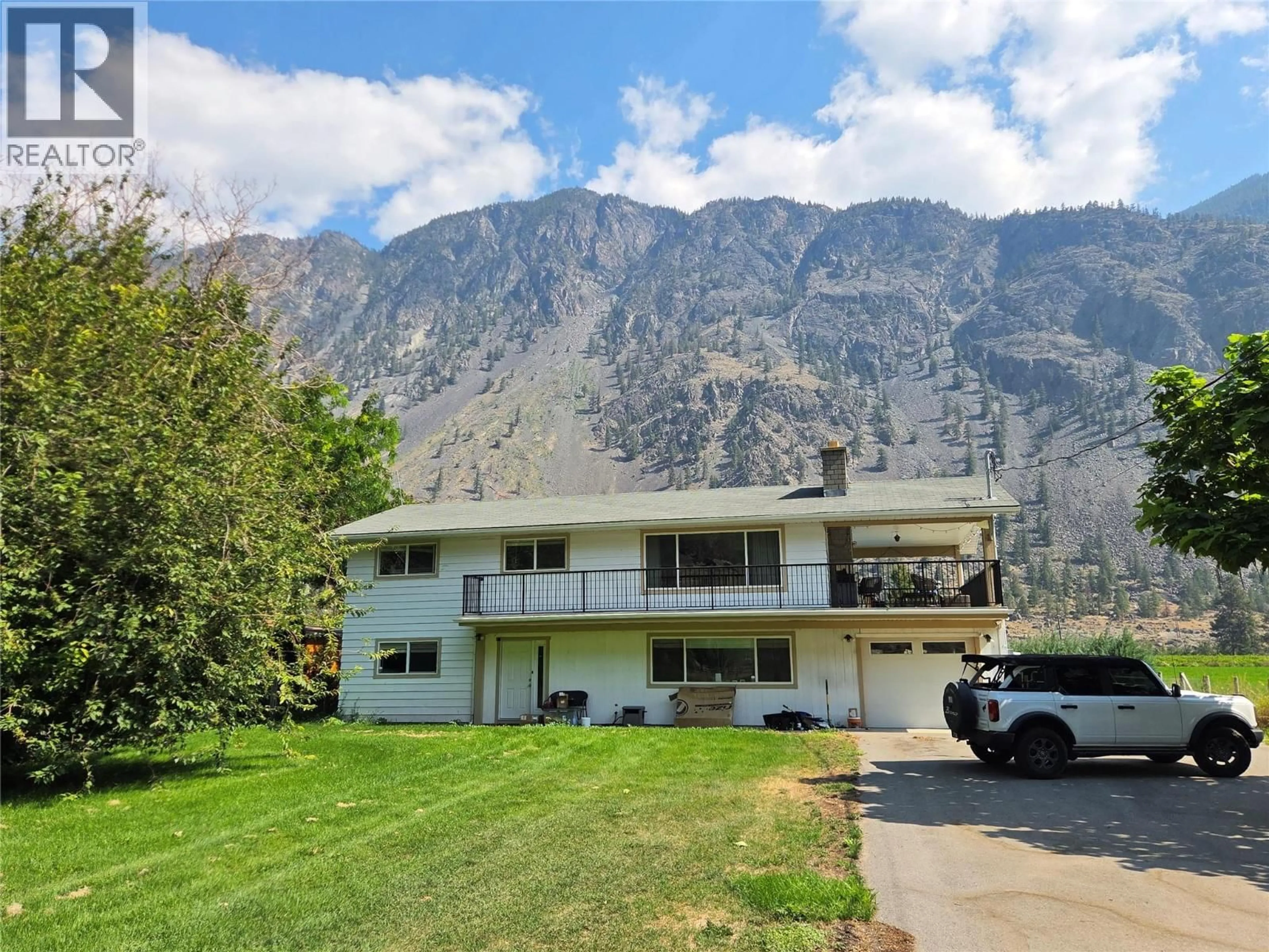 A pic from outside/outdoor area/front of a property/back of a property/a pic from drone, mountain view for 128 ASHNOLA ROAD, Keremeos British Columbia V0X1N1