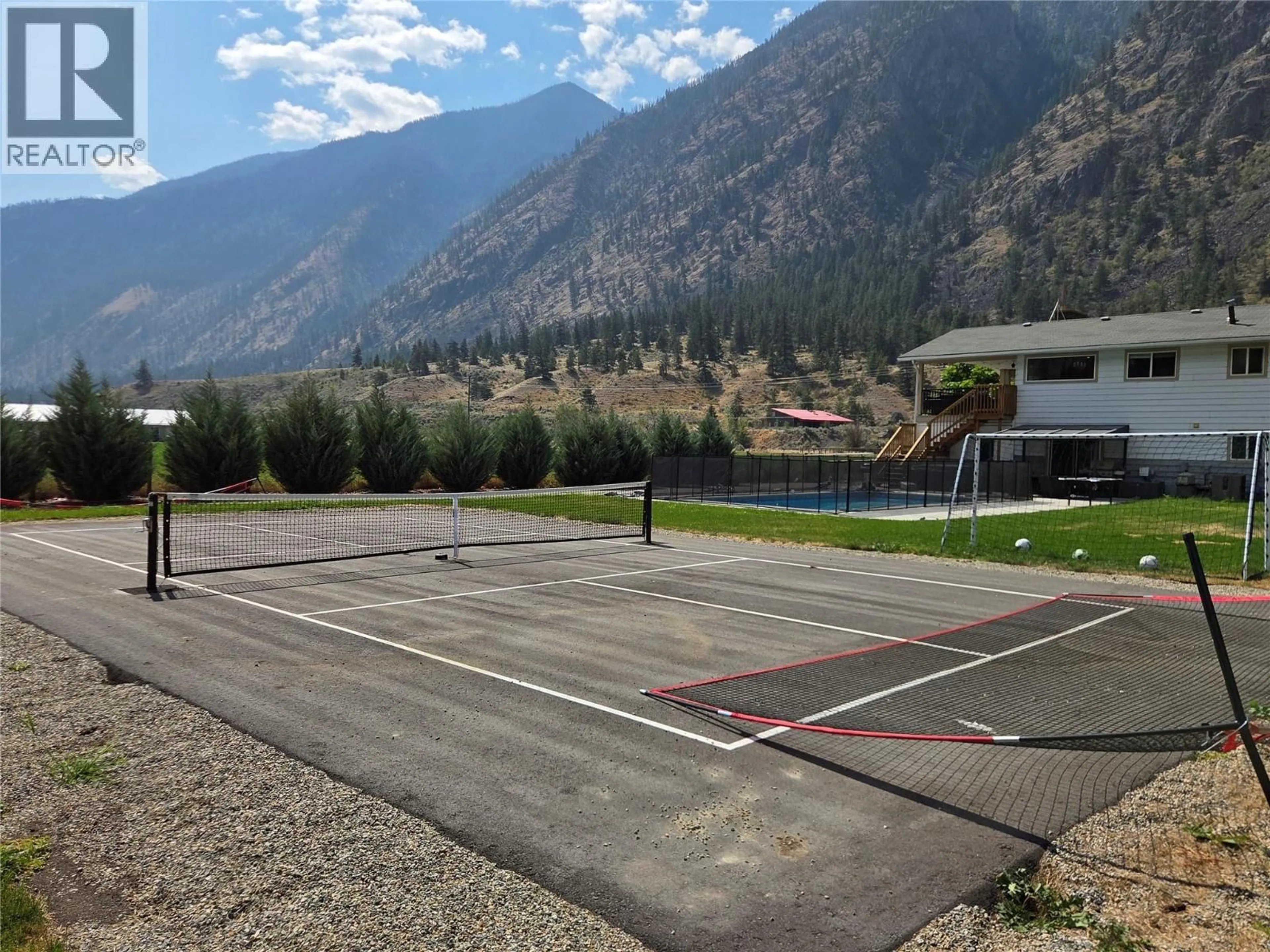 A pic from outside/outdoor area/front of a property/back of a property/a pic from drone, mountain view for 128 ASHNOLA ROAD, Keremeos British Columbia V0X1N1