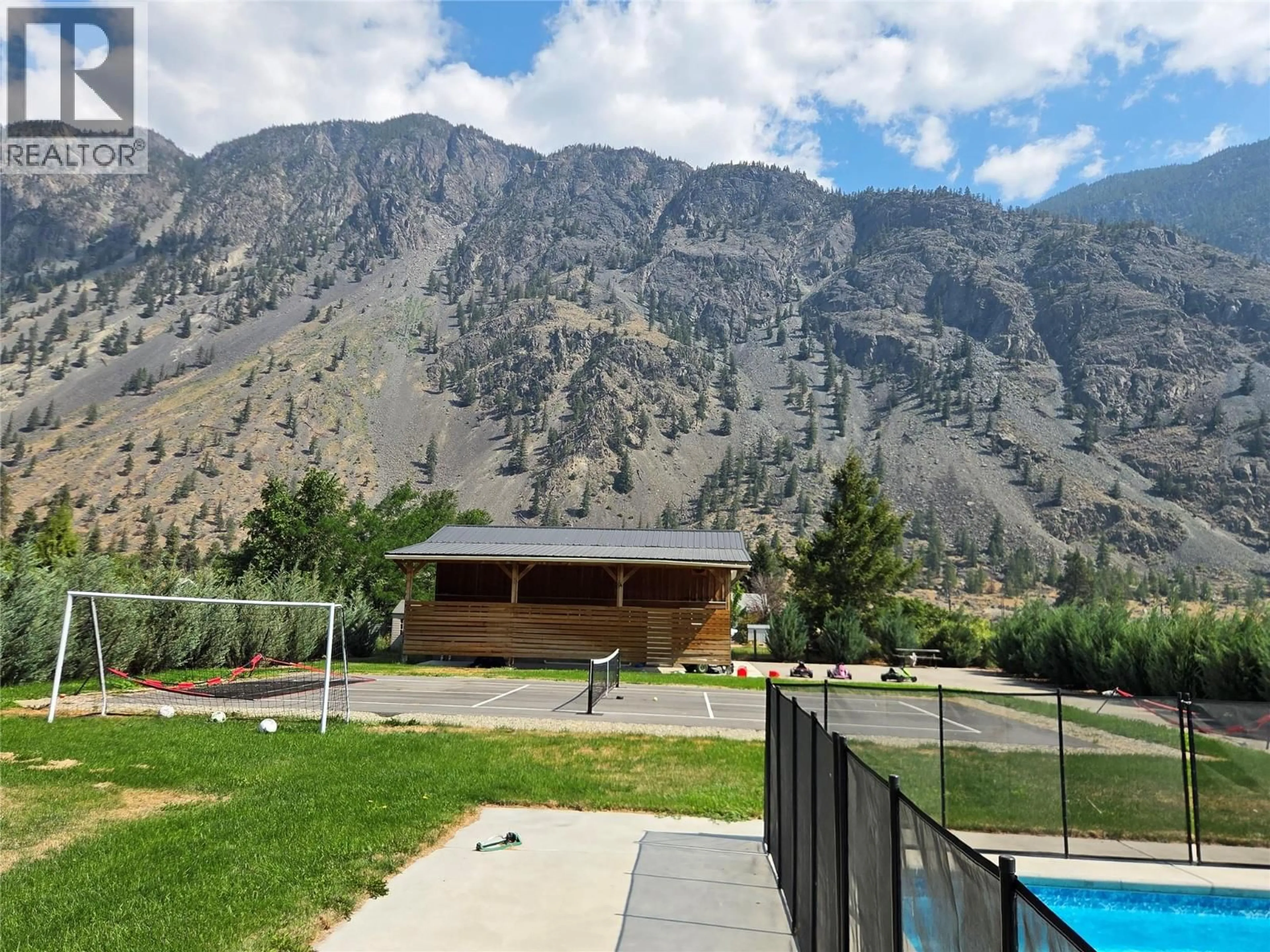 A pic from outside/outdoor area/front of a property/back of a property/a pic from drone, mountain view for 128 ASHNOLA ROAD, Keremeos British Columbia V0X1N1