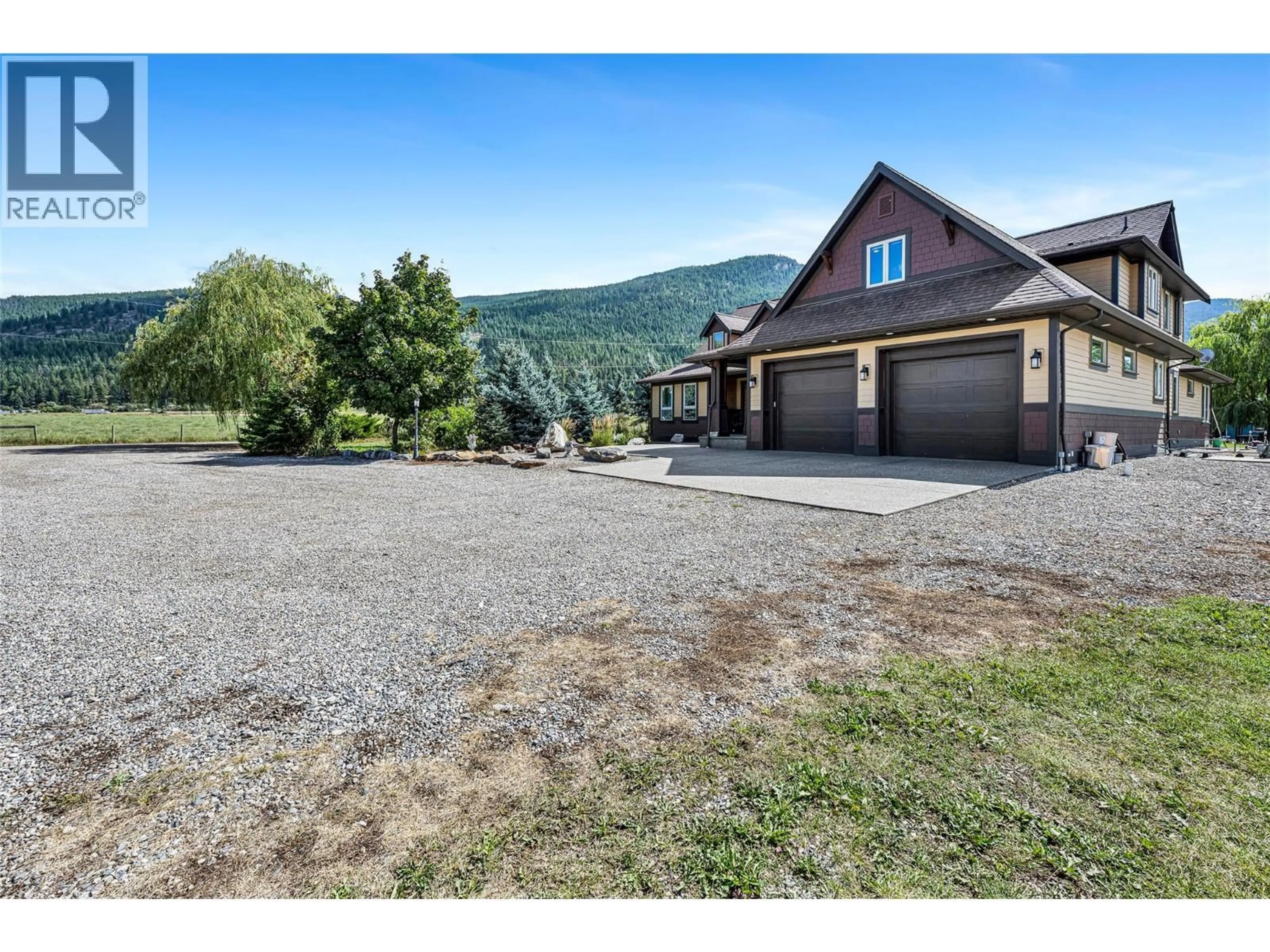 A pic from outside/outdoor area/front of a property/back of a property/a pic from drone, mountain view for 211 PLEASANT VALLEY CROSS ROAD, Armstrong British Columbia V0E1B2
