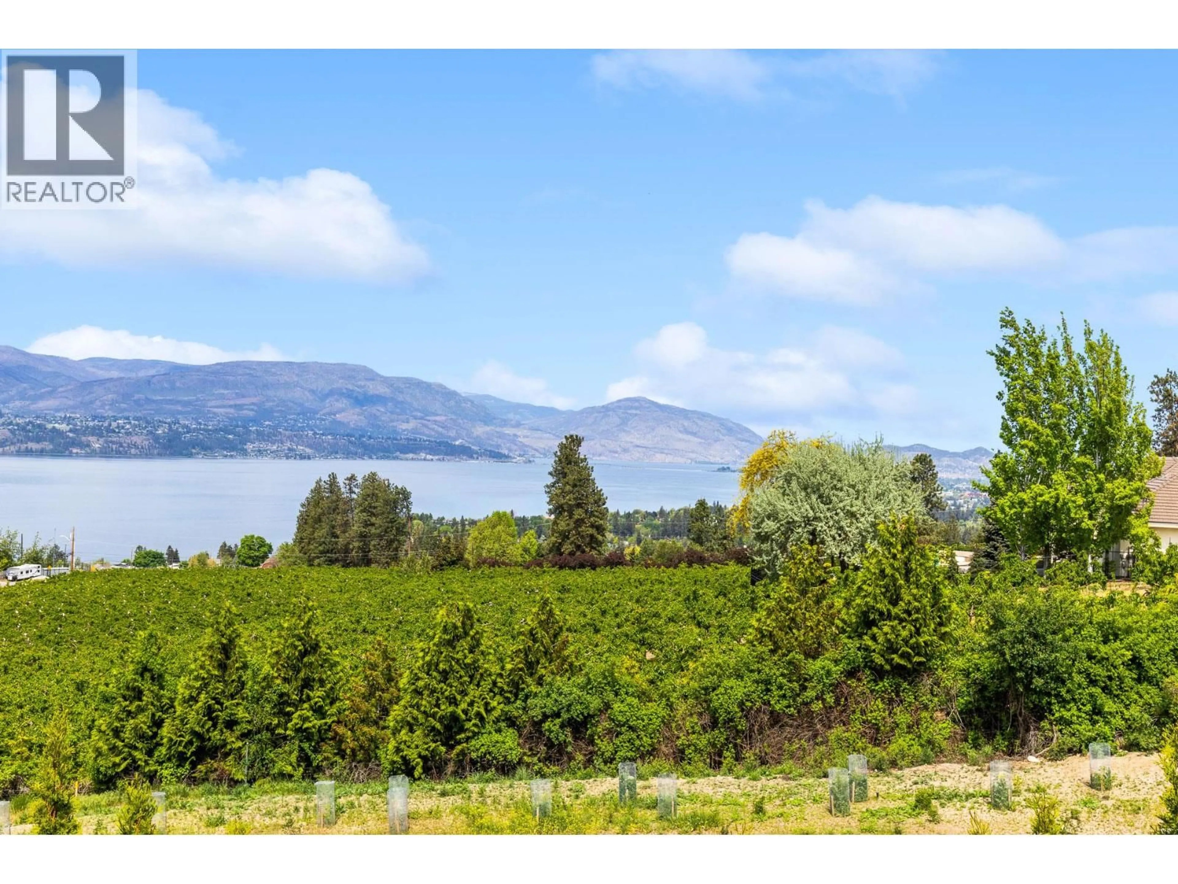 A pic from outside/outdoor area/front of a property/back of a property/a pic from drone, water/lake/river/ocean view for 546 GOWEN PLACE, Kelowna British Columbia V1W5B4
