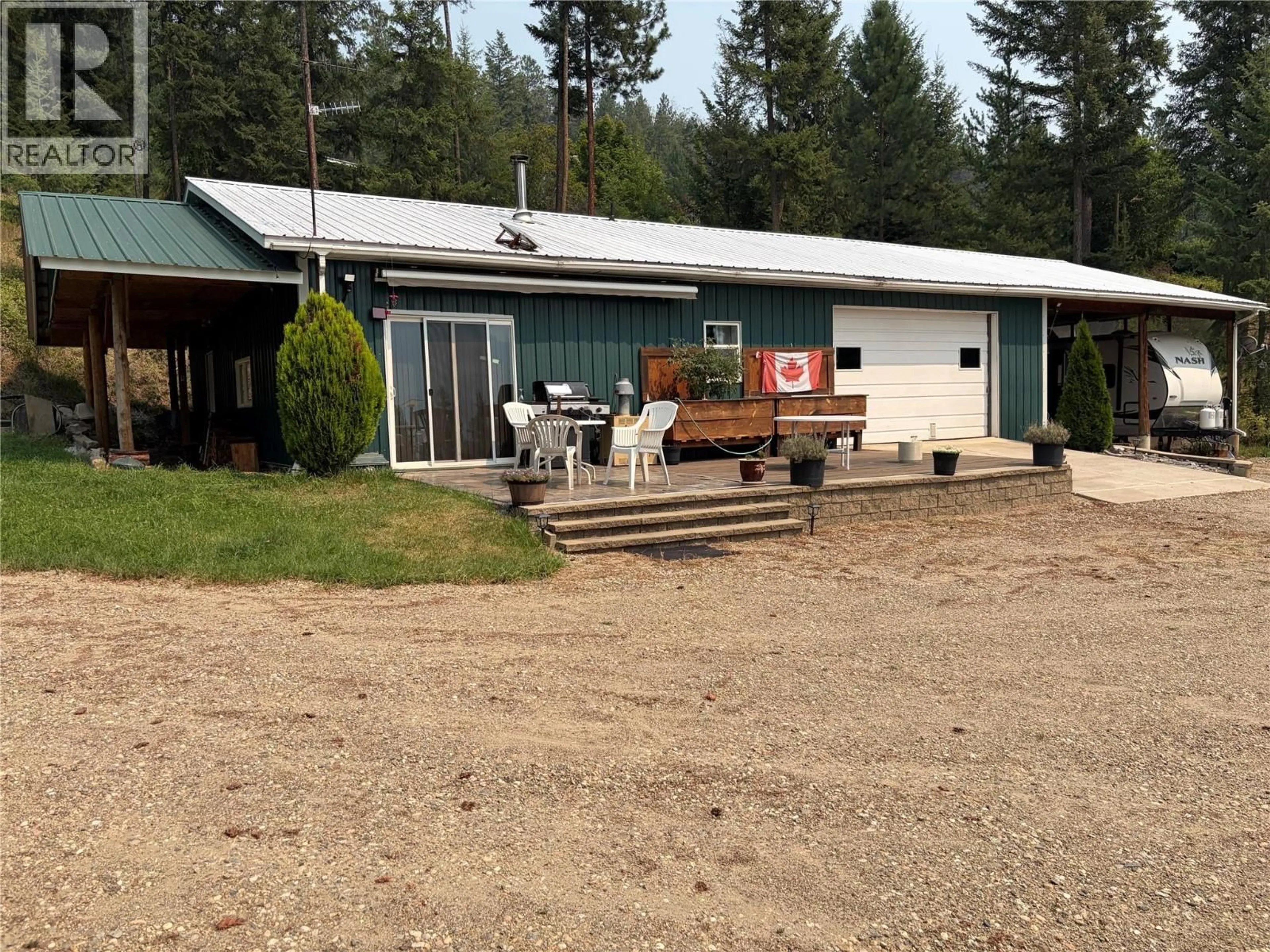 A pic from outside/outdoor area/front of a property/back of a property/a pic from drone, unknown for 7465 BROADWATER ROAD, Castlegar British Columbia V1N4V8