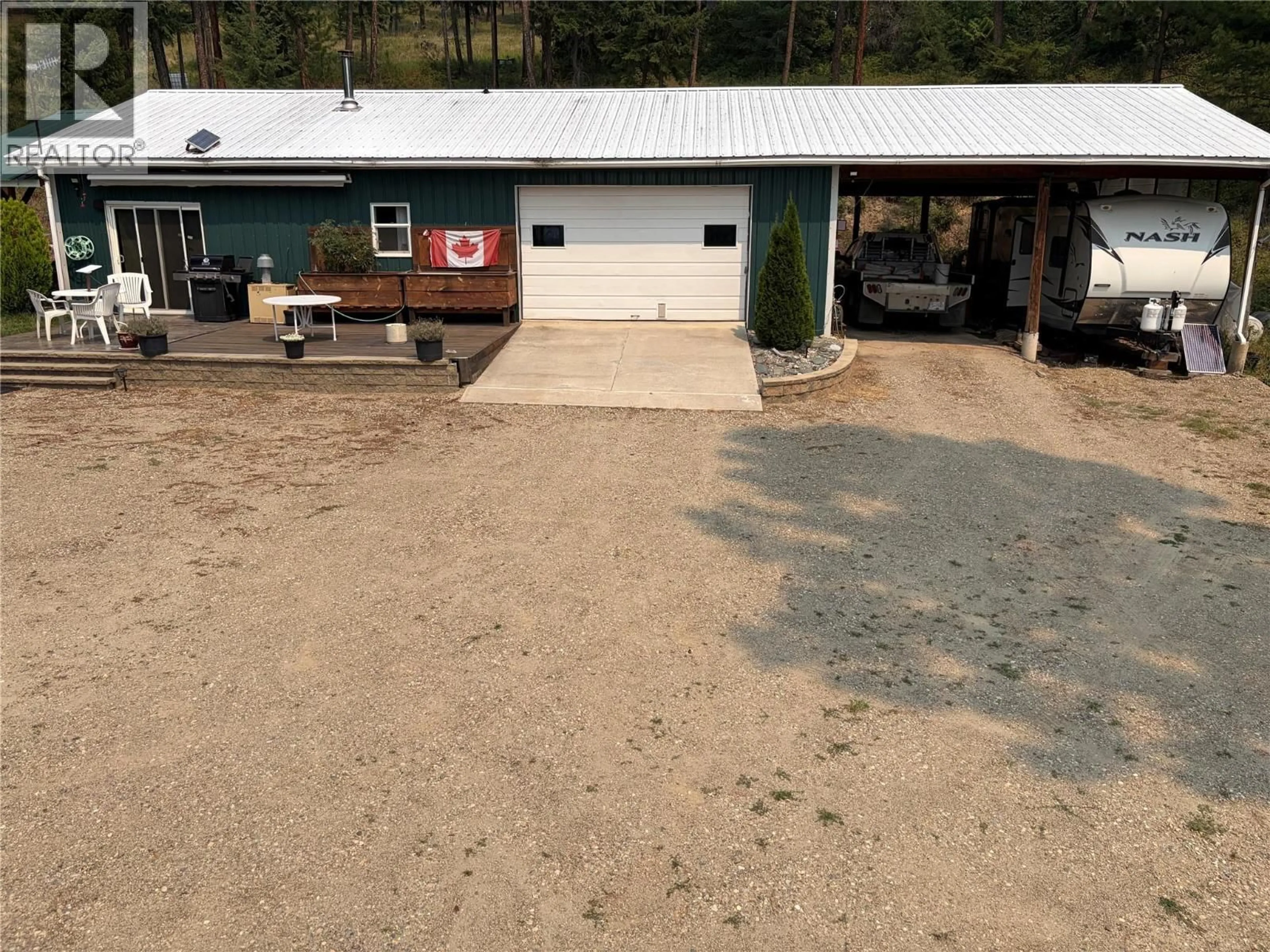A pic from outside/outdoor area/front of a property/back of a property/a pic from drone, building for 7465 BROADWATER ROAD, Castlegar British Columbia V1N4V8