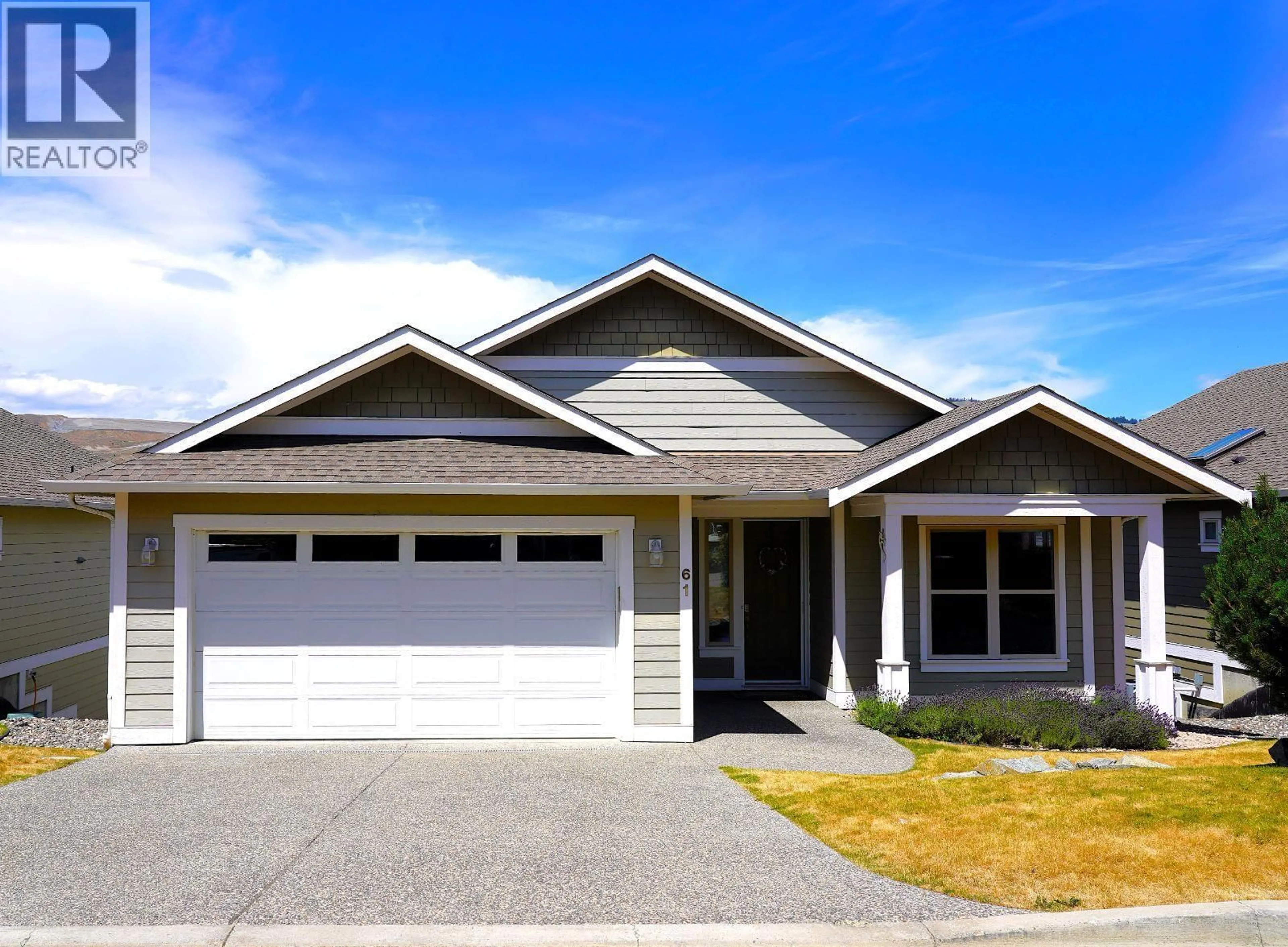 Home with vinyl exterior material, street for 61 - 7760 OKANAGAN LANDING ROAD, Okanagan Landing British Columbia V1H1Z4