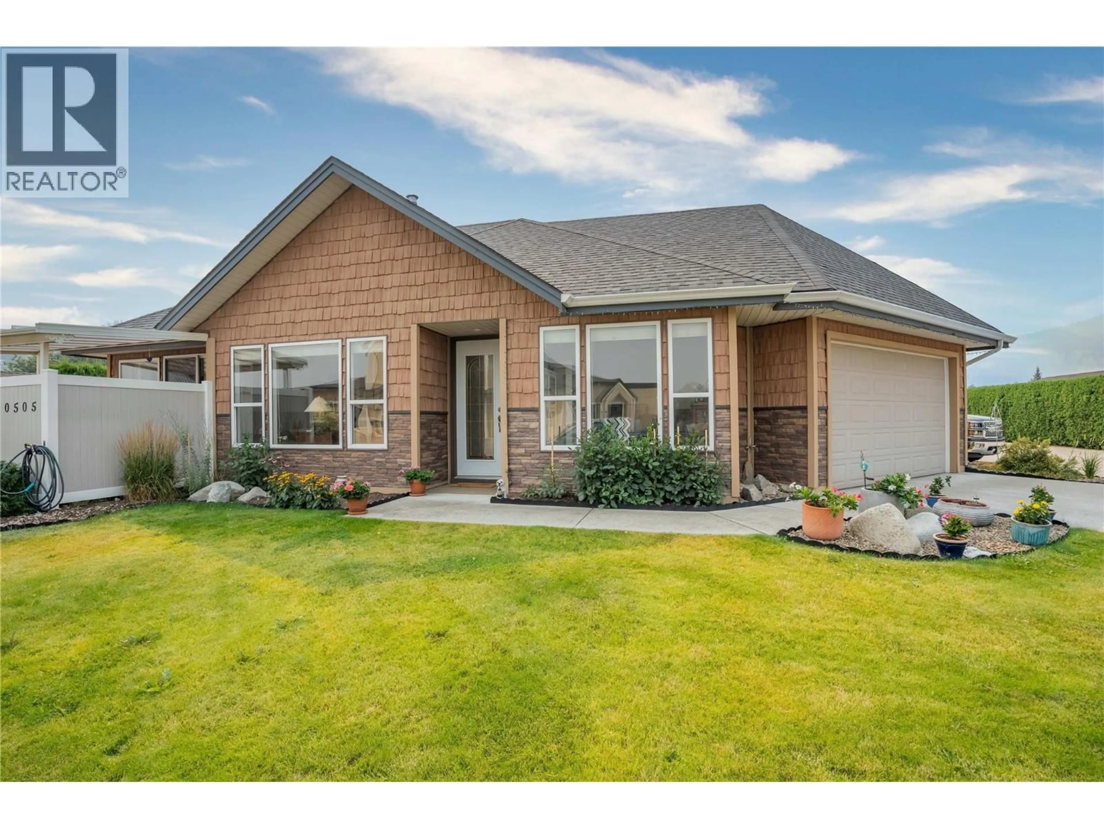 Home with brick exterior material, street for 1 - 10505 ELLIOT STREET, Summerland British Columbia V0H1Z0
