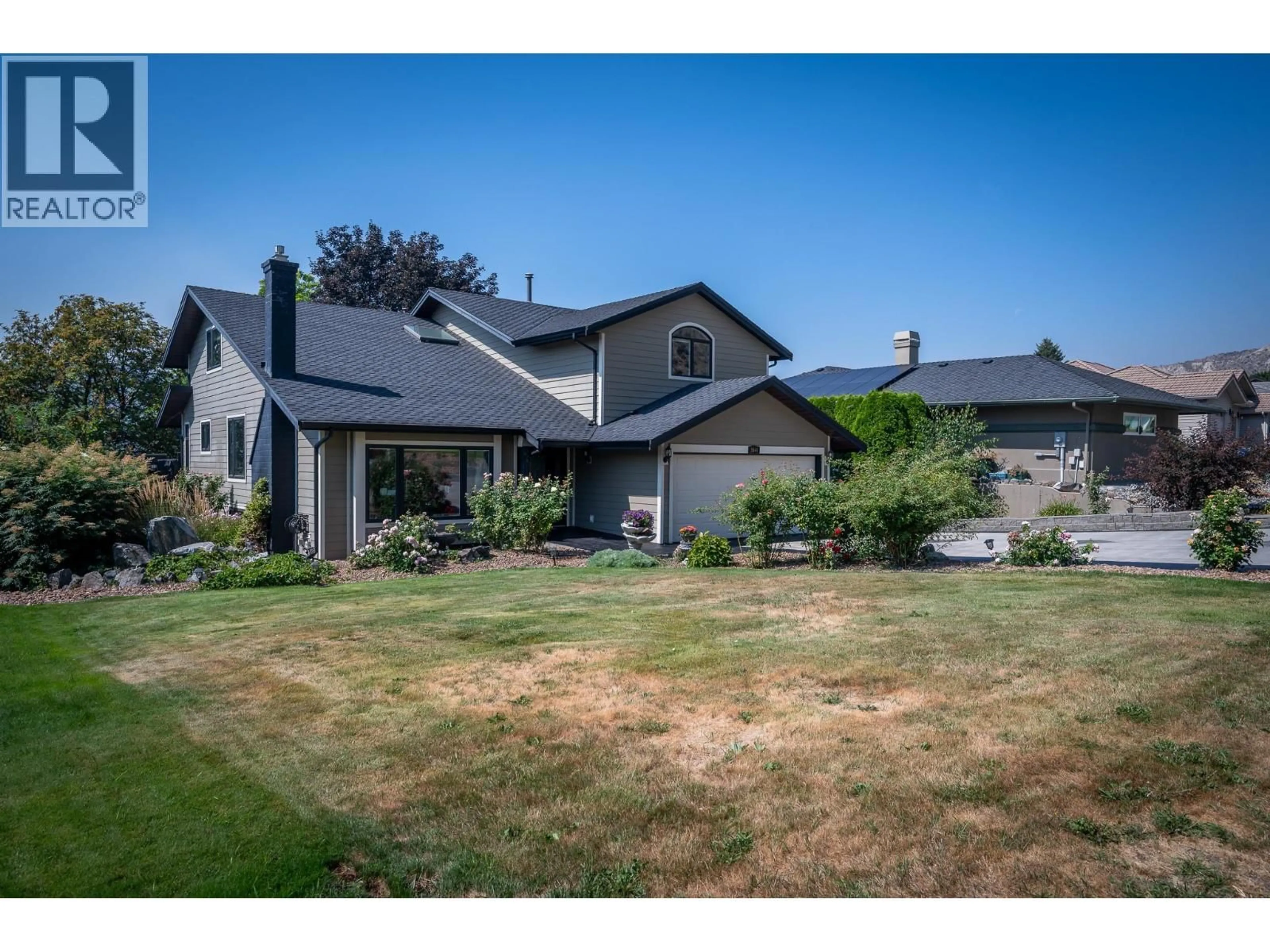 A pic from outside/outdoor area/front of a property/back of a property/a pic from drone, street for 3544 NAVATANEE DRIVE, Kamloops British Columbia V2H1S1