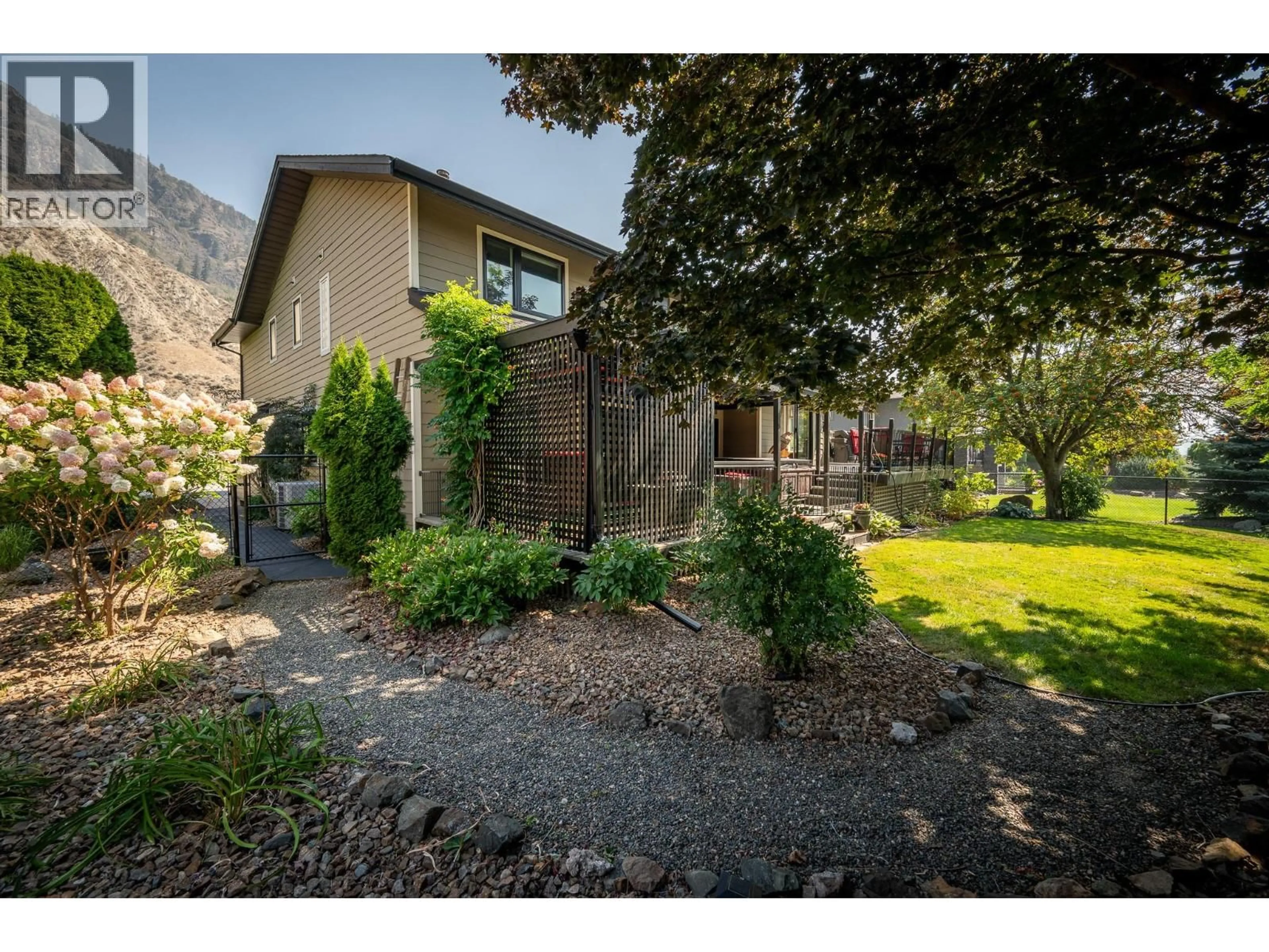 A pic from outside/outdoor area/front of a property/back of a property/a pic from drone, mountain view for 3544 NAVATANEE DRIVE, Kamloops British Columbia V2H1S1