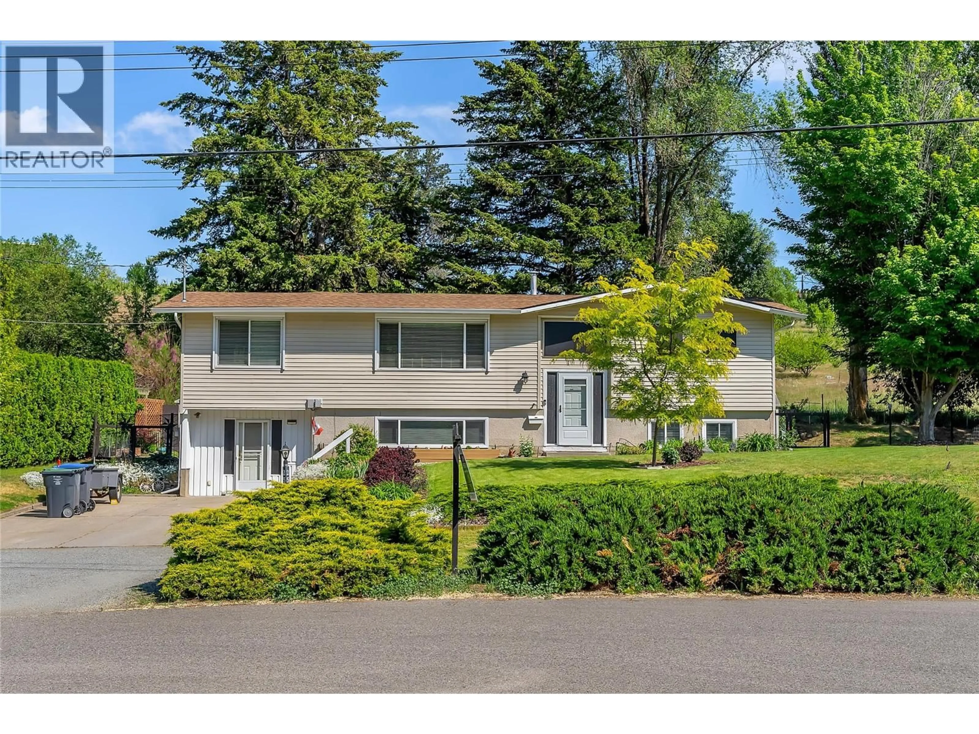 Home with vinyl exterior material, street for 2545 COLLEEN ROAD, West Kelowna British Columbia V1Z2K6