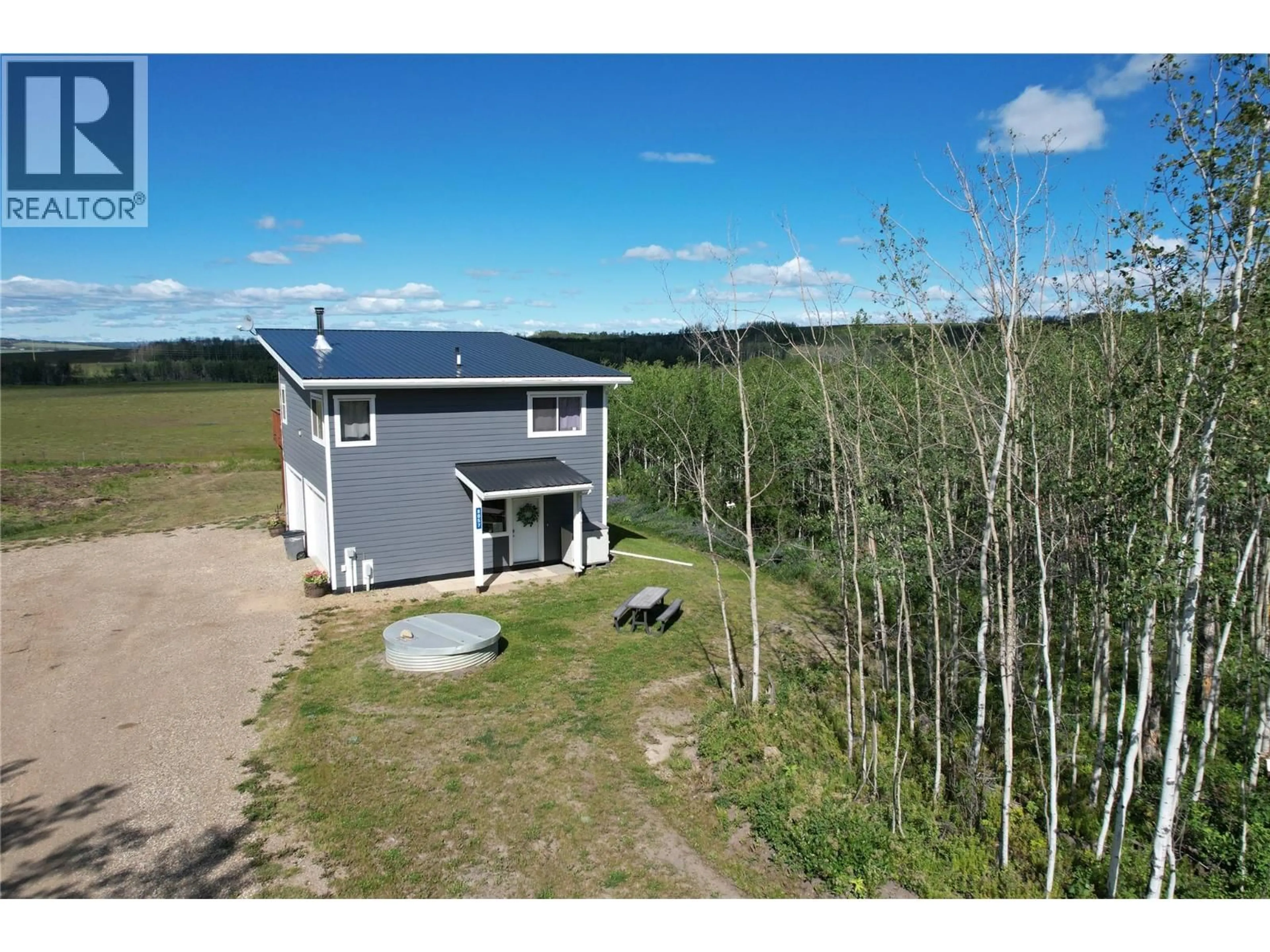 A pic from outside/outdoor area/front of a property/back of a property/a pic from drone, unknown for 8057 HARPER OTHER, Dawson Creek British Columbia V1G2C0