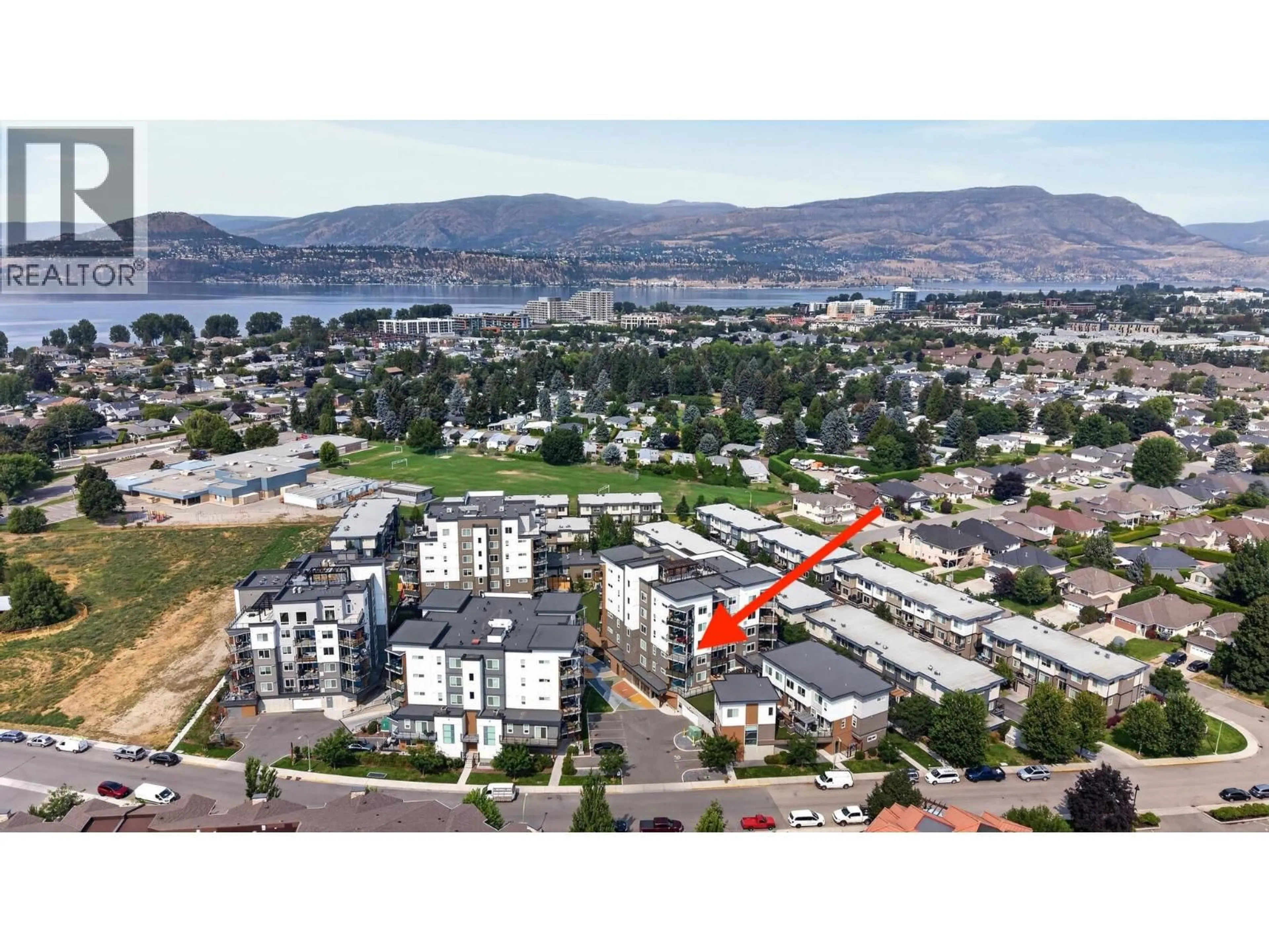 A pic from outside/outdoor area/front of a property/back of a property/a pic from drone, mountain view for 401 - 3630 MISSION SPRINGS DRIVE, Kelowna British Columbia V1W0B2