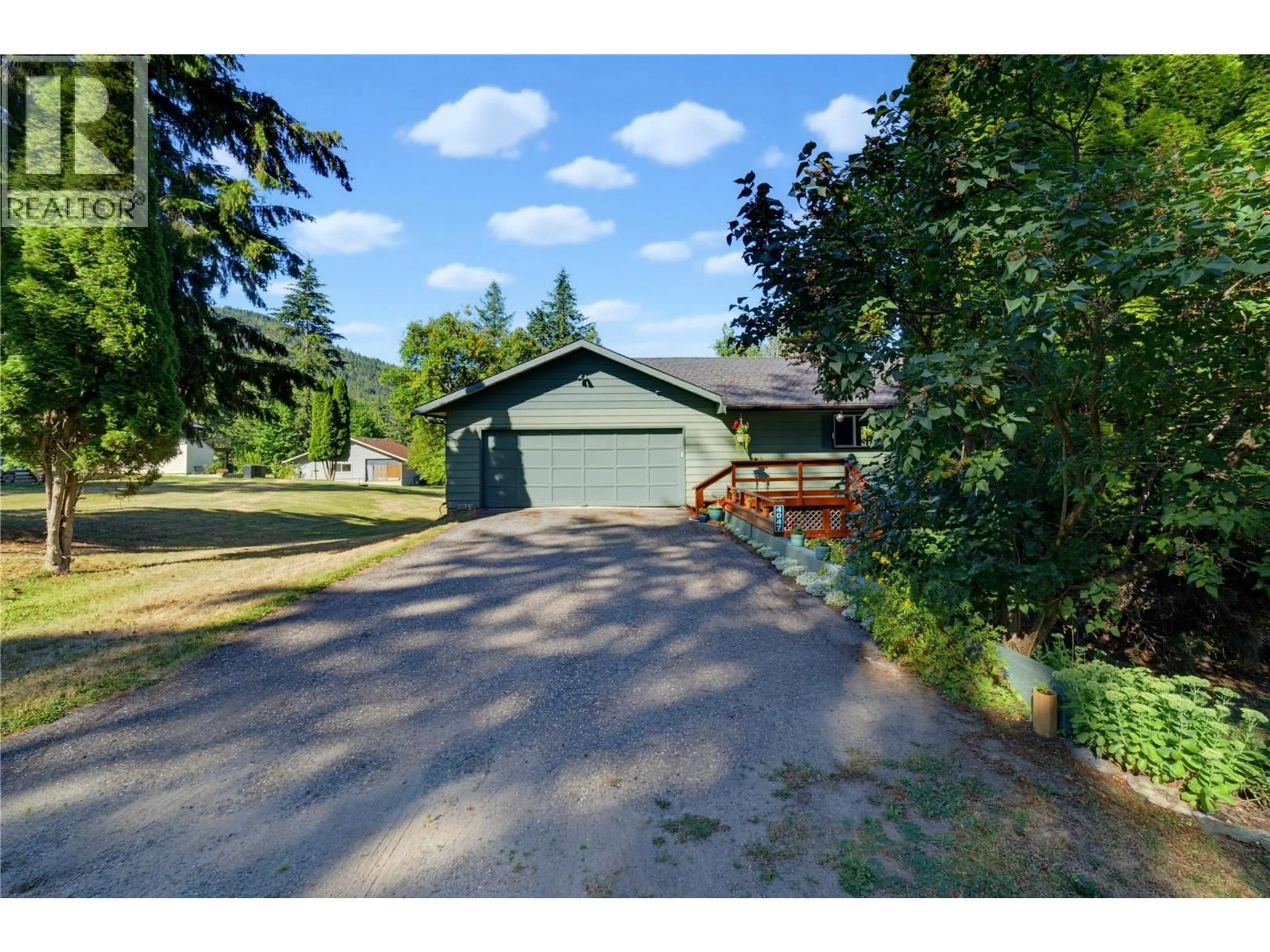 A pic from outside/outdoor area/front of a property/back of a property/a pic from drone, street for 4047 TORRY ROAD, Eagle Bay British Columbia V0E1T0
