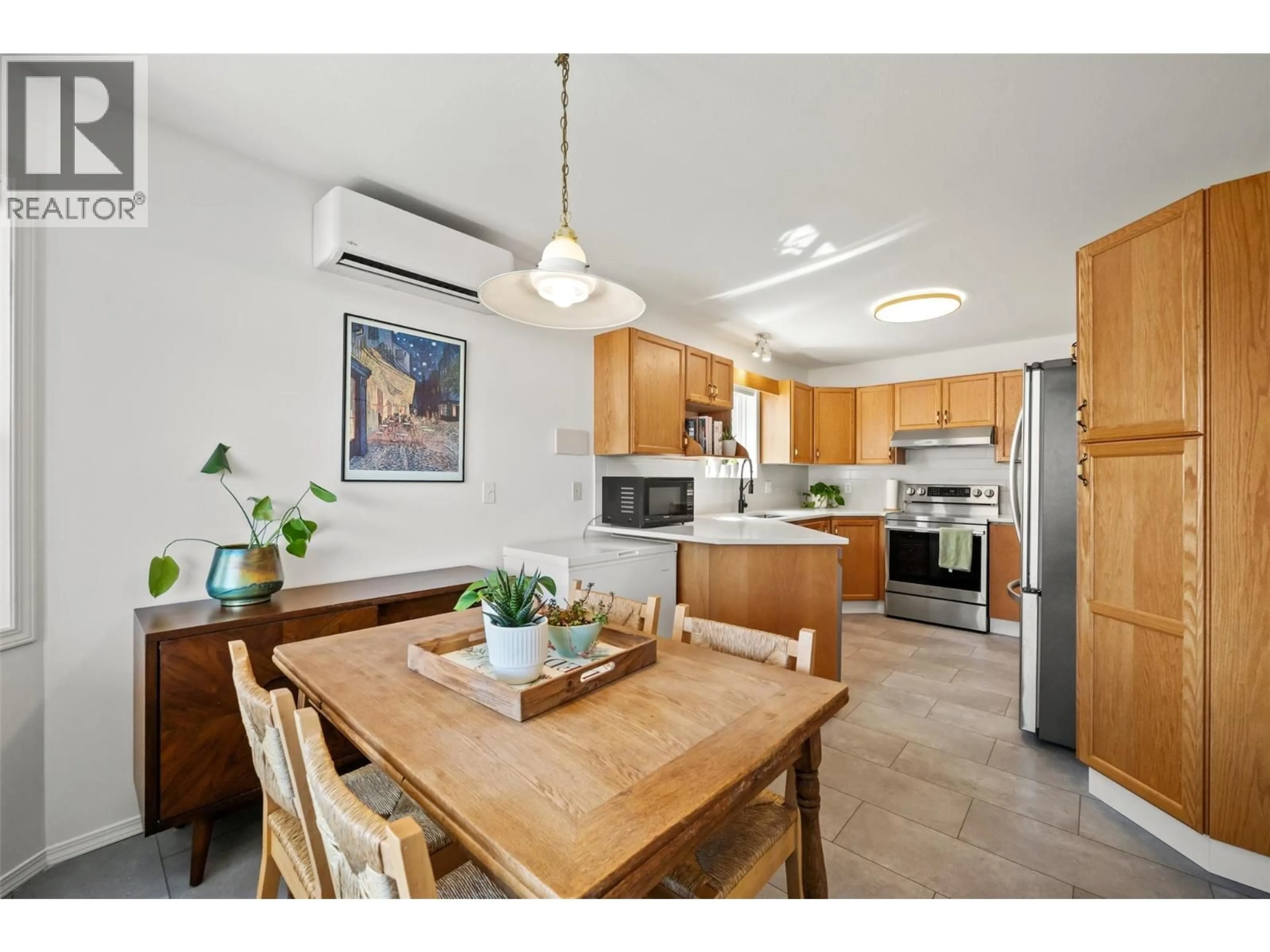 Open concept kitchen, unknown for 102 - 626 VAN HORNE STREET, Penticton British Columbia V2A4L1