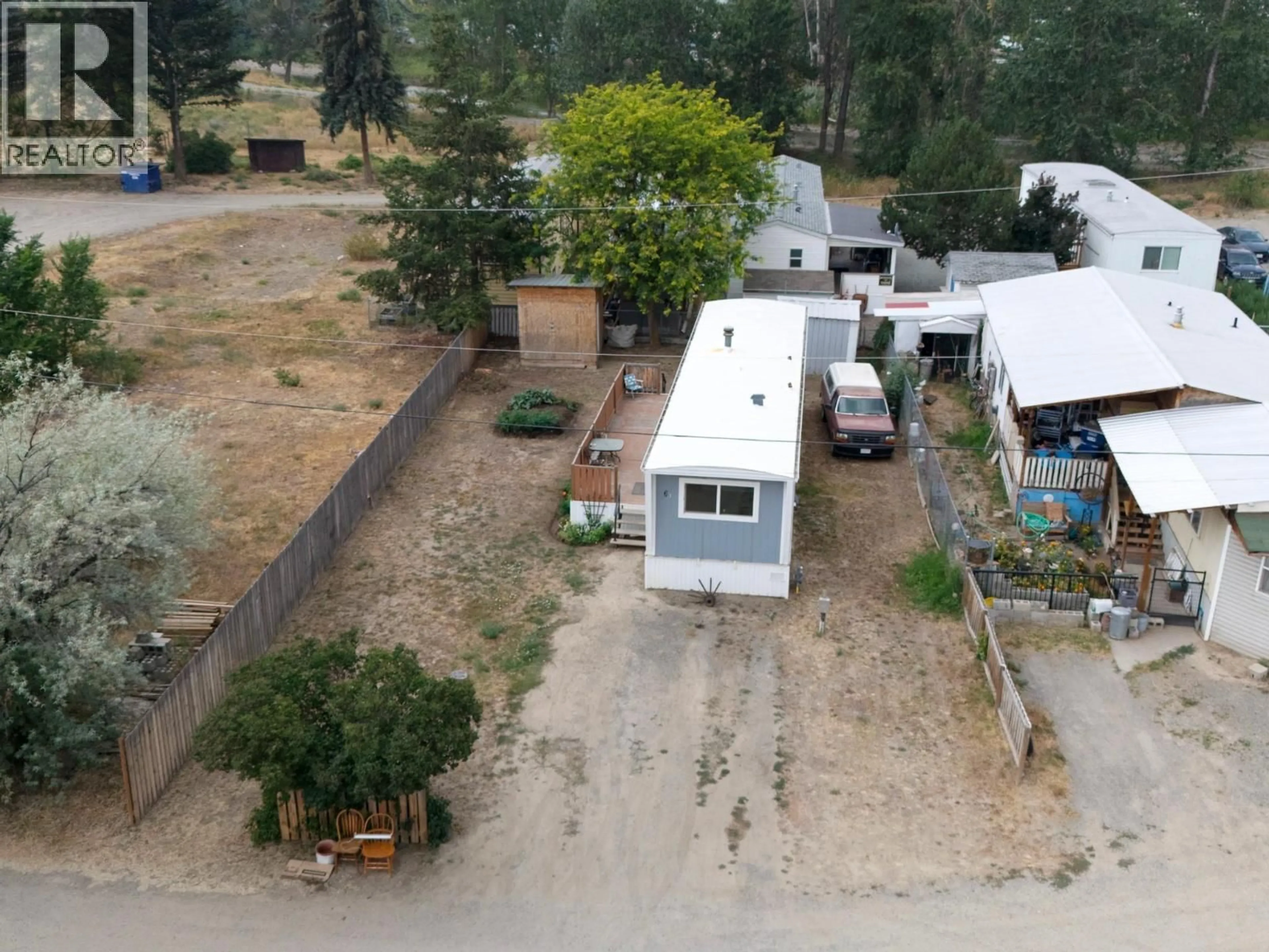 A pic from outside/outdoor area/front of a property/back of a property/a pic from drone, street for 6B - 1500 SPRING STREET, Merritt British Columbia V1K1B8