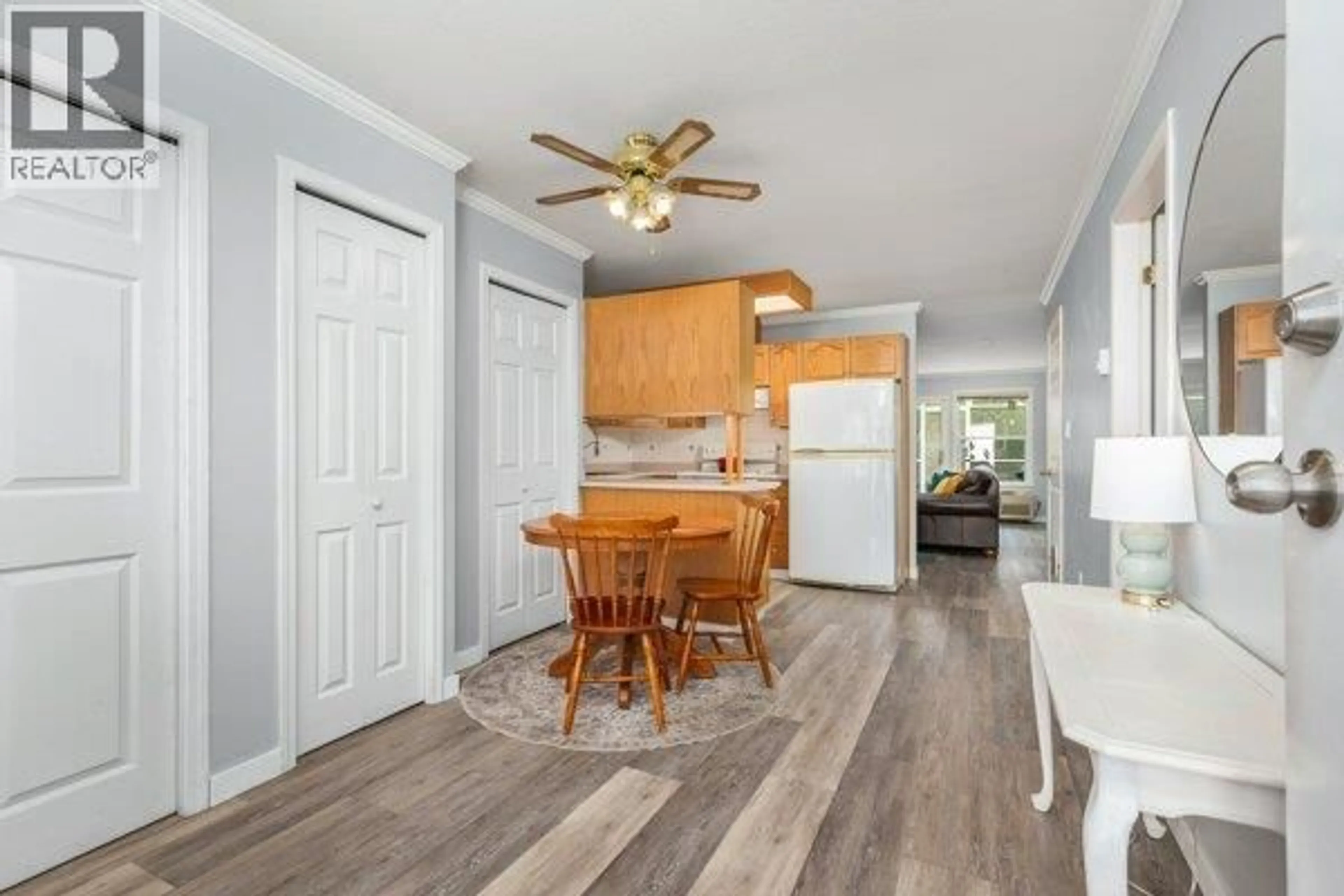 Open concept kitchen, wood/laminate floor for 33 - 4740 20 STREET, Vernon British Columbia V1T9N7