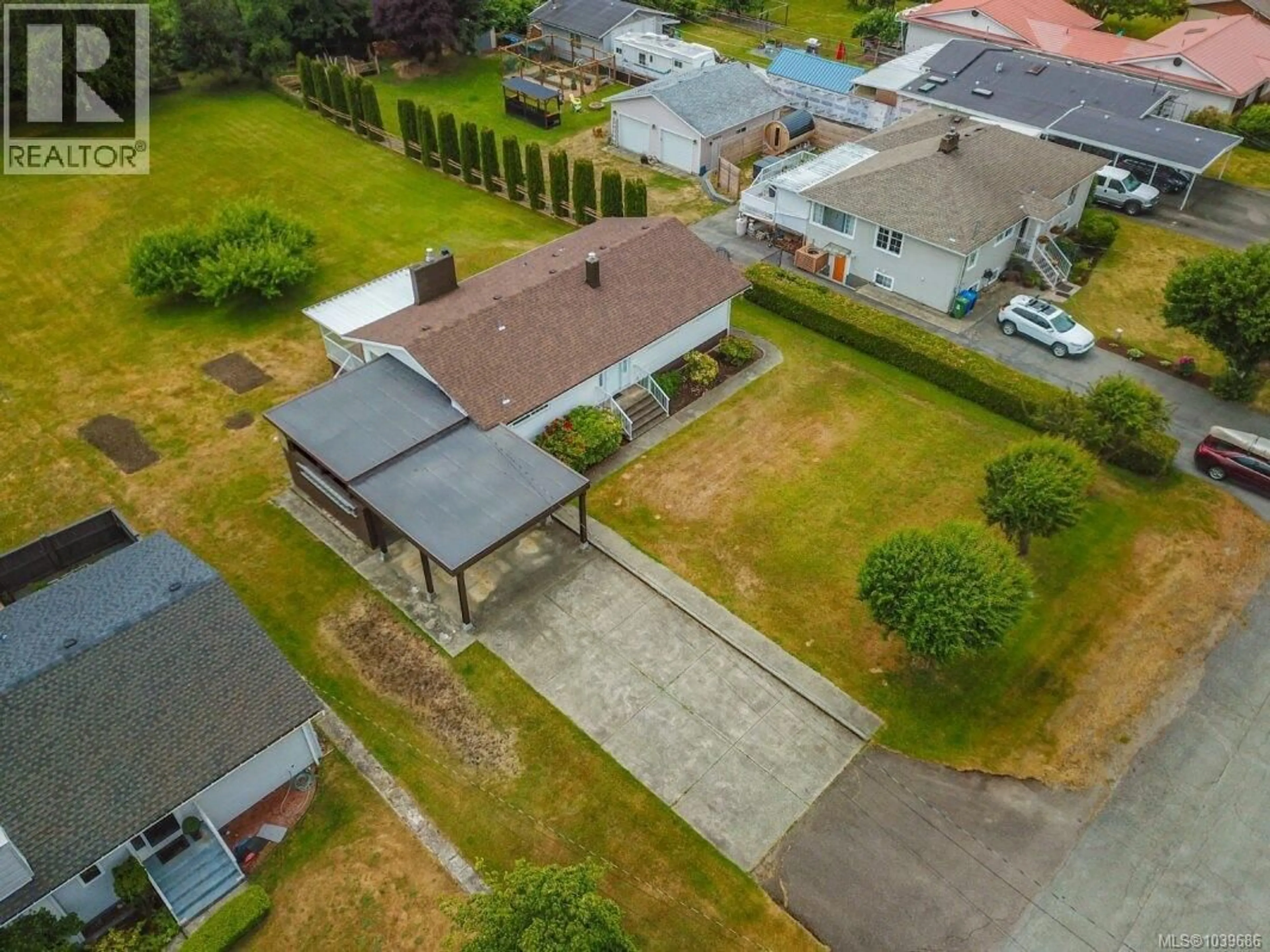 A pic from outside/outdoor area/front of a property/back of a property/a pic from drone, street for 5128 FORREST ROAD, Port Alberni British Columbia V9Y7A8