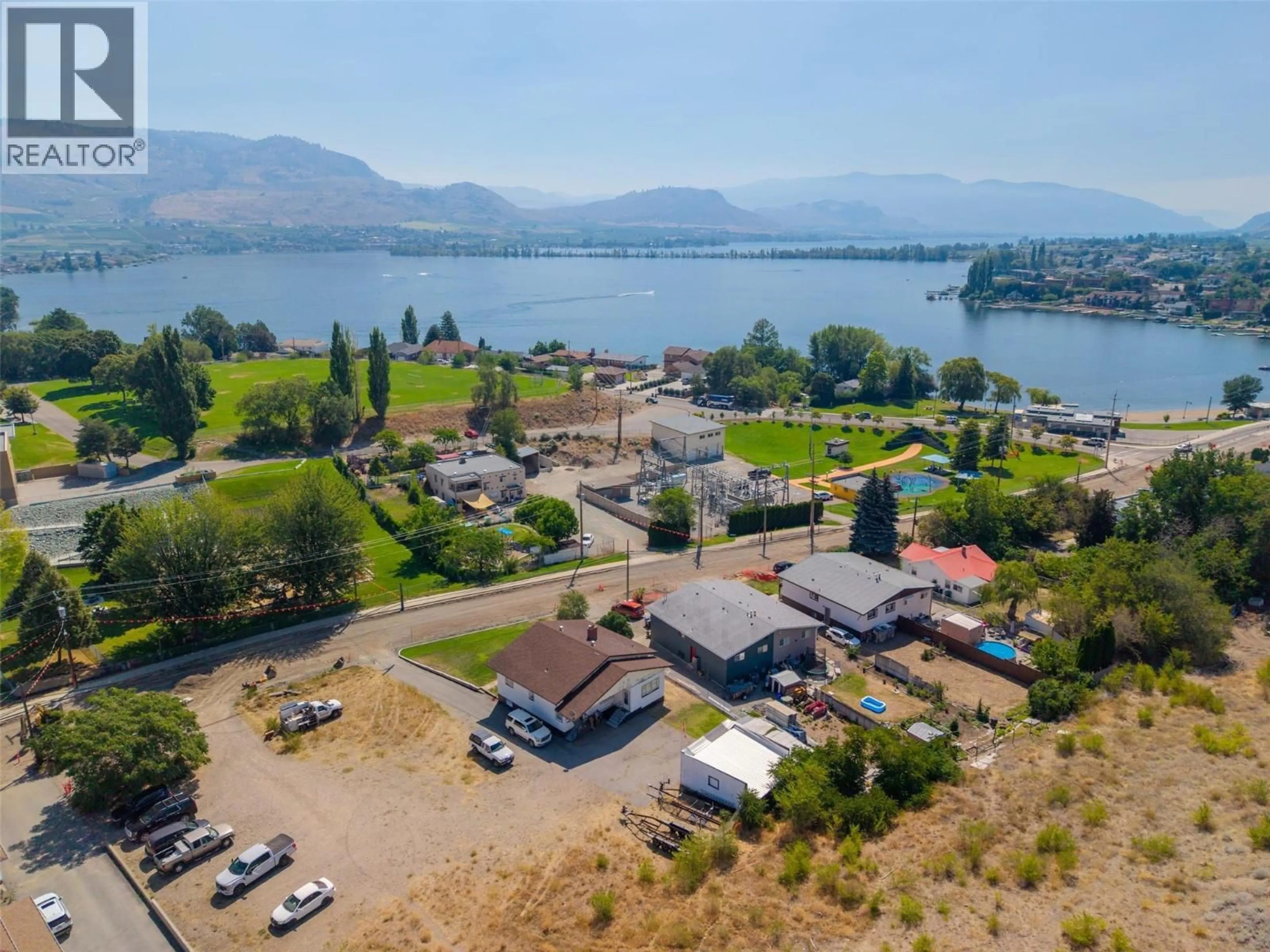 A pic from outside/outdoor area/front of a property/back of a property/a pic from drone, water/lake/river/ocean view for 6802 89TH STREET, Osoyoos British Columbia V0H1V1