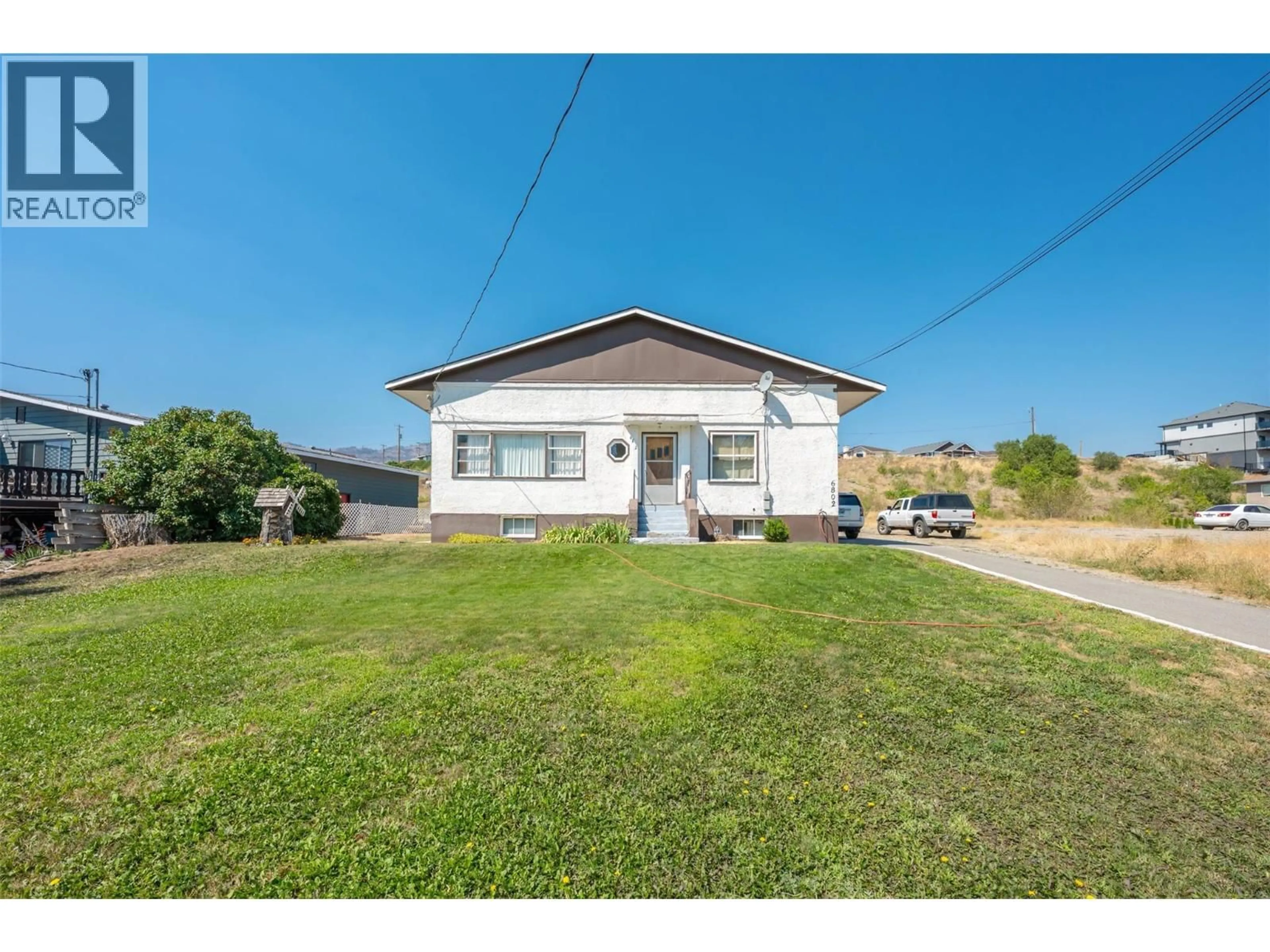 A pic from outside/outdoor area/front of a property/back of a property/a pic from drone, unknown for 6802 89TH STREET, Osoyoos British Columbia V0H1V1