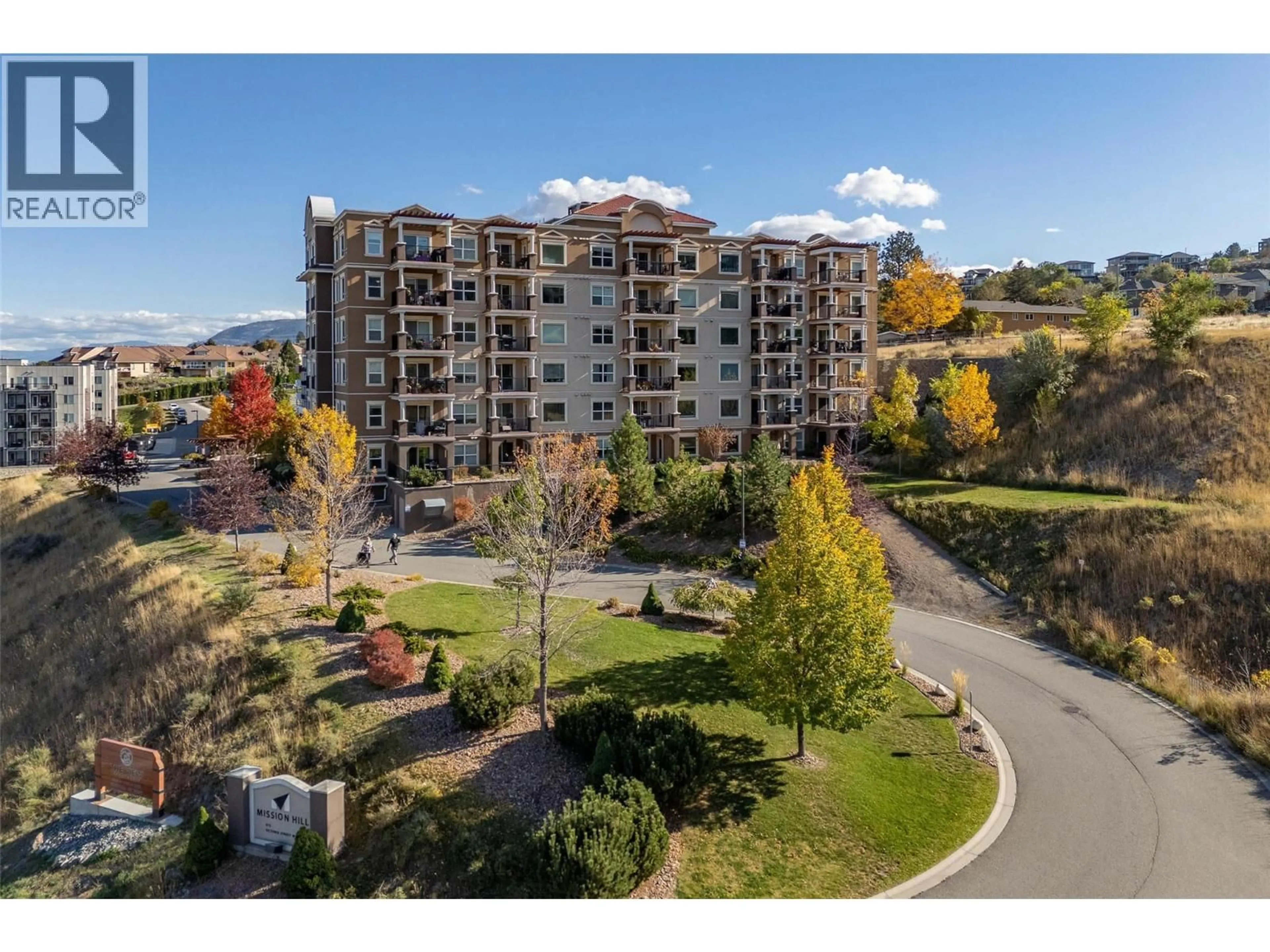 A pic from outside/outdoor area/front of a property/back of a property/a pic from drone, mountain view for 606 - 975 VICTORIA STREET WEST, Kamloops British Columbia V2C0C2
