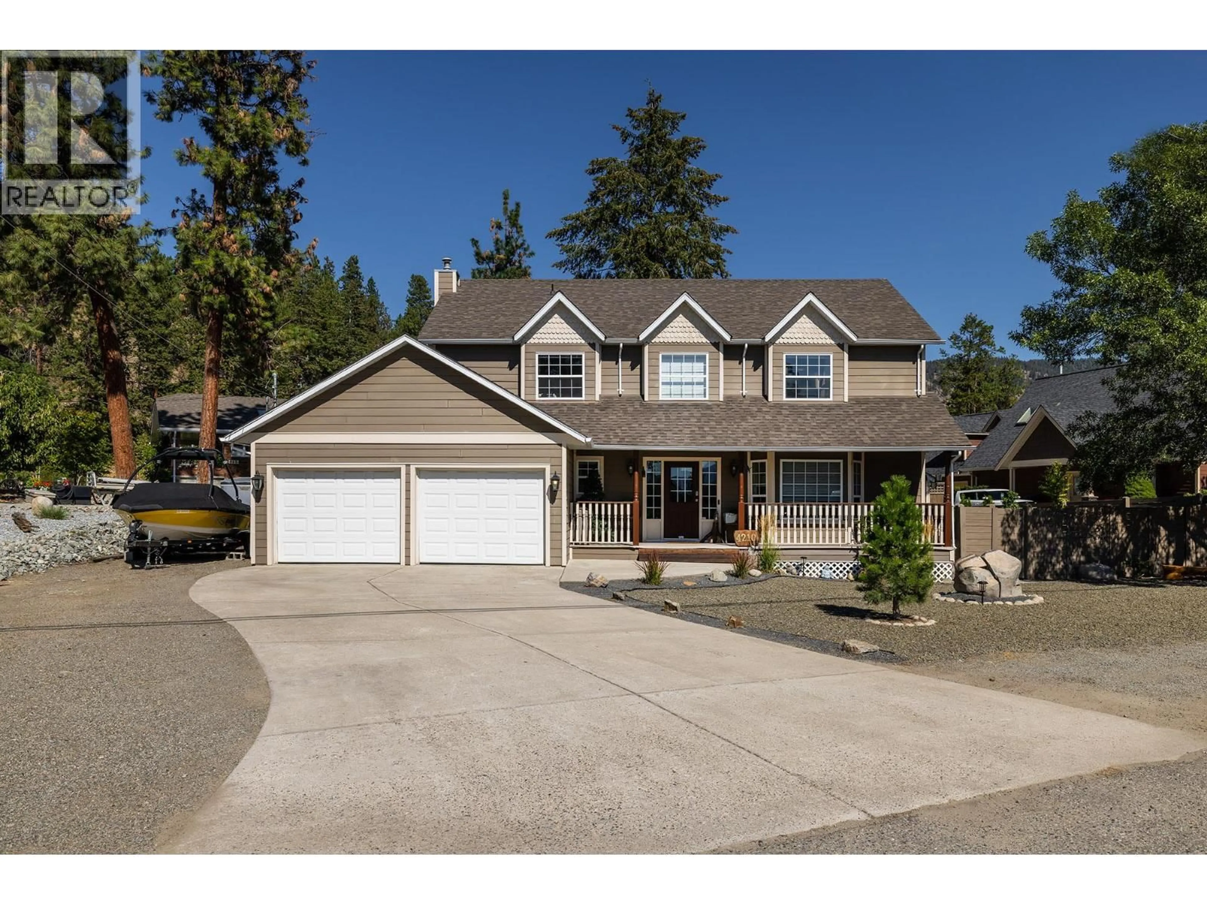 Home with vinyl exterior material, street for 4210 6TH AVENUE, Peachland British Columbia V0H1X5