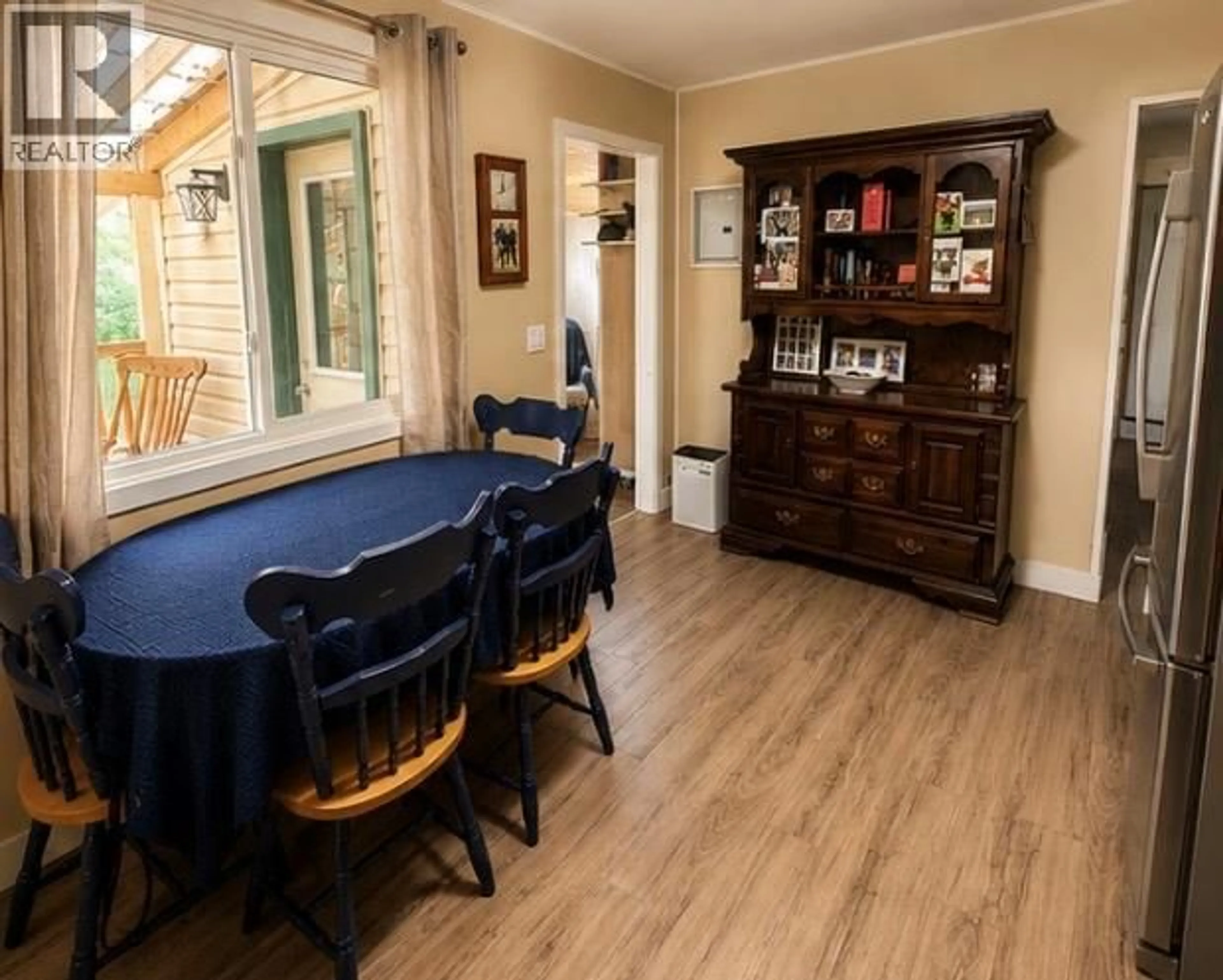 Dining room, wood/laminate floor for 4604 47 AVENUE NORTHEAST, Chetwynd British Columbia V0C1J0