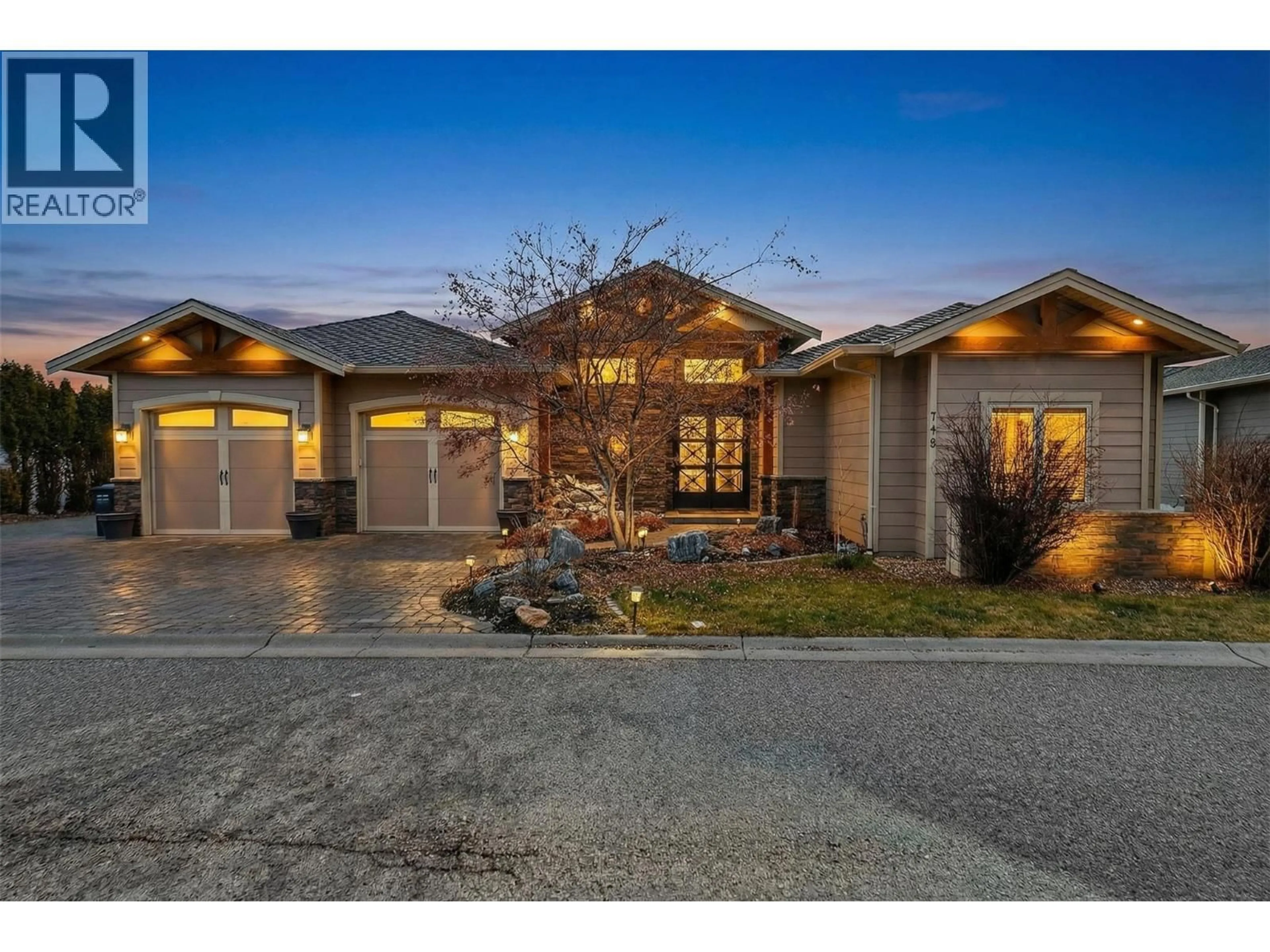 Home with brick exterior material, street for 748 TRADITIONS CRESCENT, Kelowna British Columbia V1V2Y2
