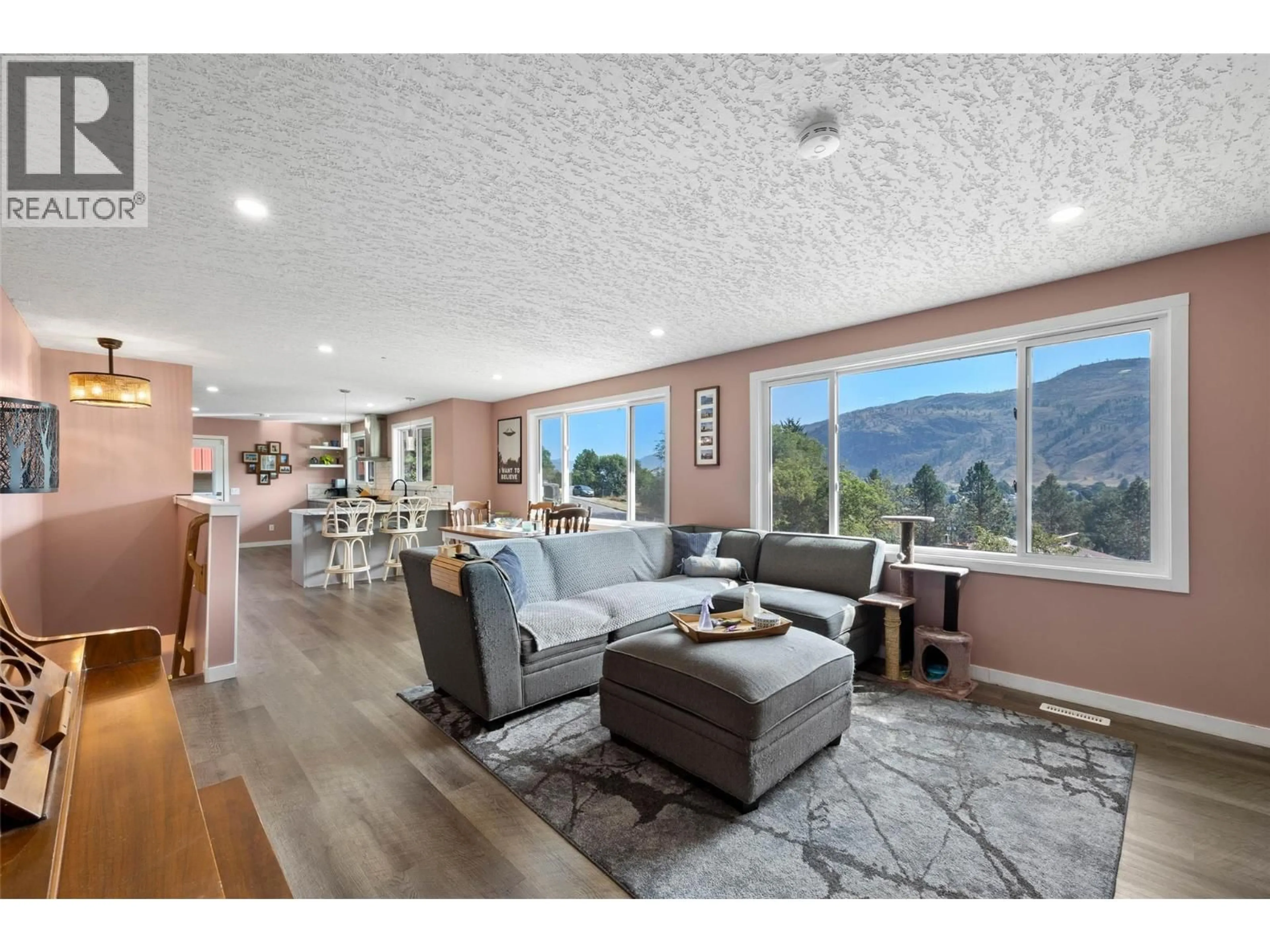 Living room with furniture, wood/laminate floor for 4326 KARINDALE ROAD, Kamloops British Columbia V2B8N1