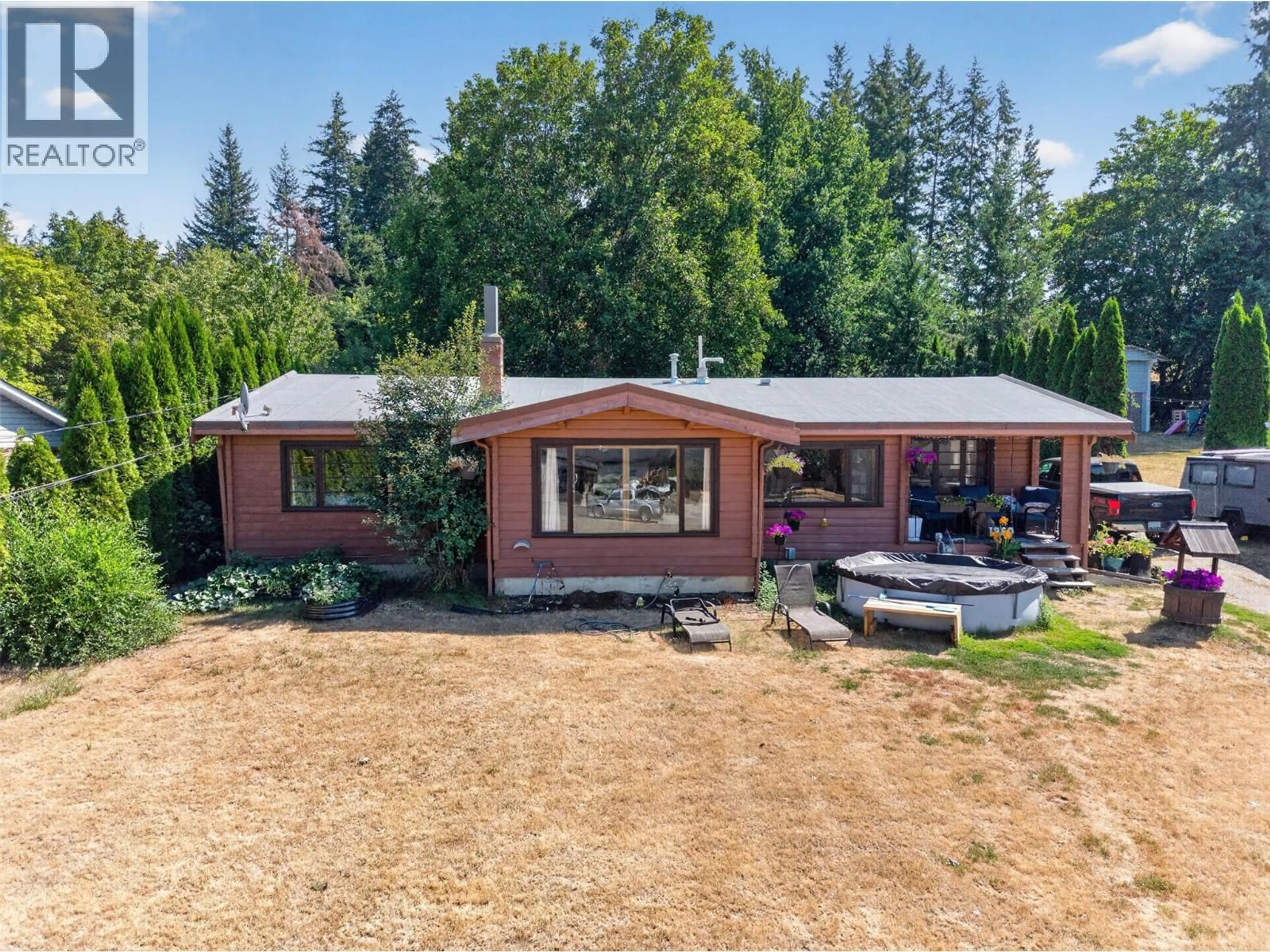 A pic from outside/outdoor area/front of a property/back of a property/a pic from drone, unknown for 1260 16 STREET NORTHEAST, Salmon Arm British Columbia V1E2V1