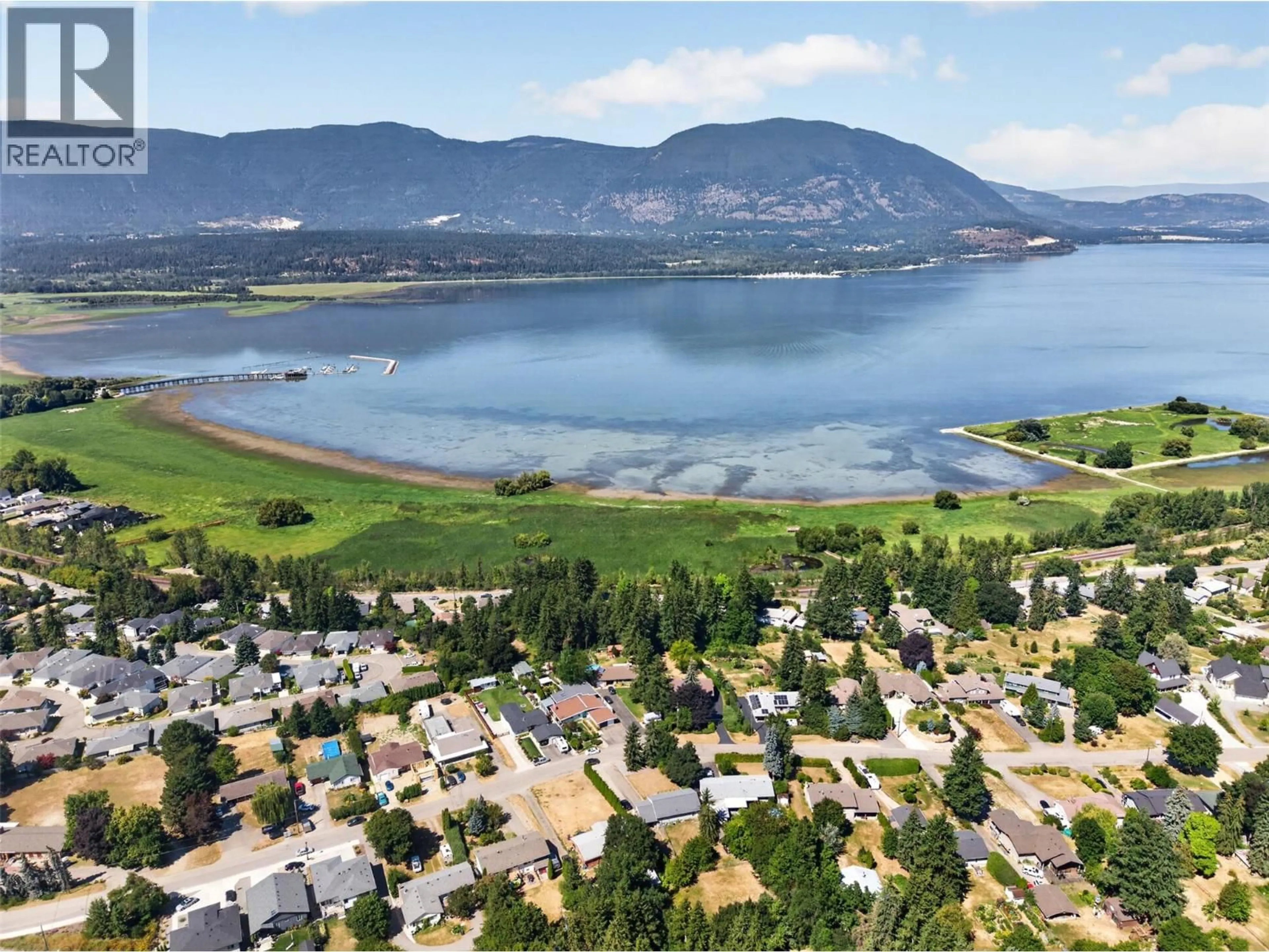 A pic from outside/outdoor area/front of a property/back of a property/a pic from drone, water/lake/river/ocean view for 1260 16 STREET NORTHEAST, Salmon Arm British Columbia V1E2V1