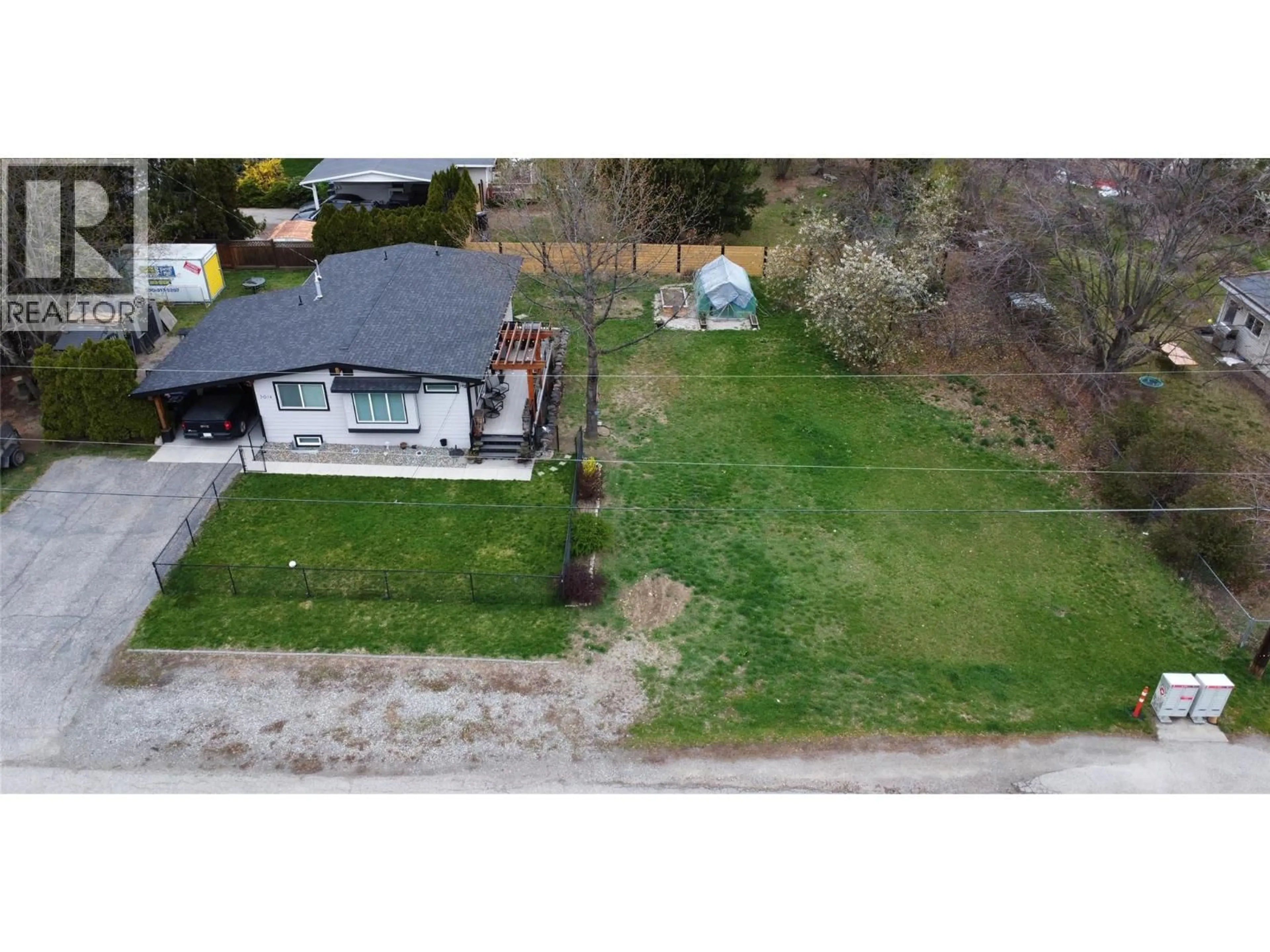 A pic from outside/outdoor area/front of a property/back of a property/a pic from drone, street for 3014 HARWOOD ROAD, Lake Country British Columbia V4V1M7